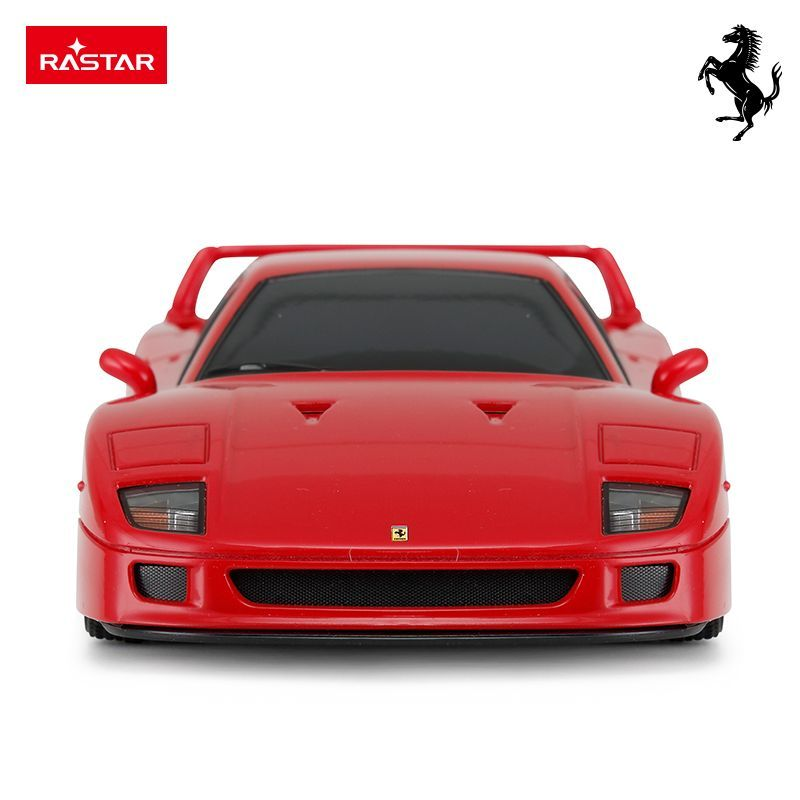 Czerwony samochód zabawkowa Ferrari, widok z przodu. Logo Rastar po lewej, logo konia po prawej.
