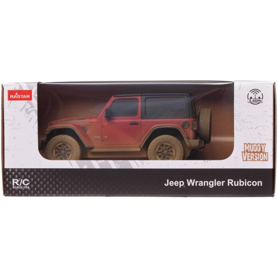 Czerwony, zabłocony Jeep Wrangler Rubicon zabawka w opakowaniu.