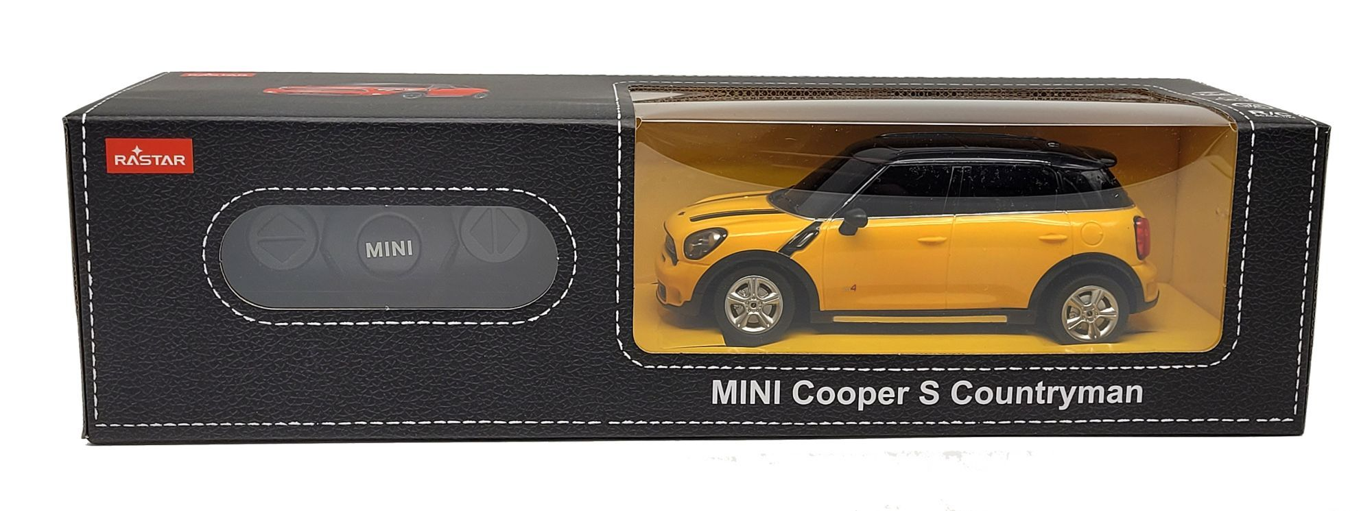 Żółty samochodzik Mini Cooper S Countryman w pudełku z pilotem.
