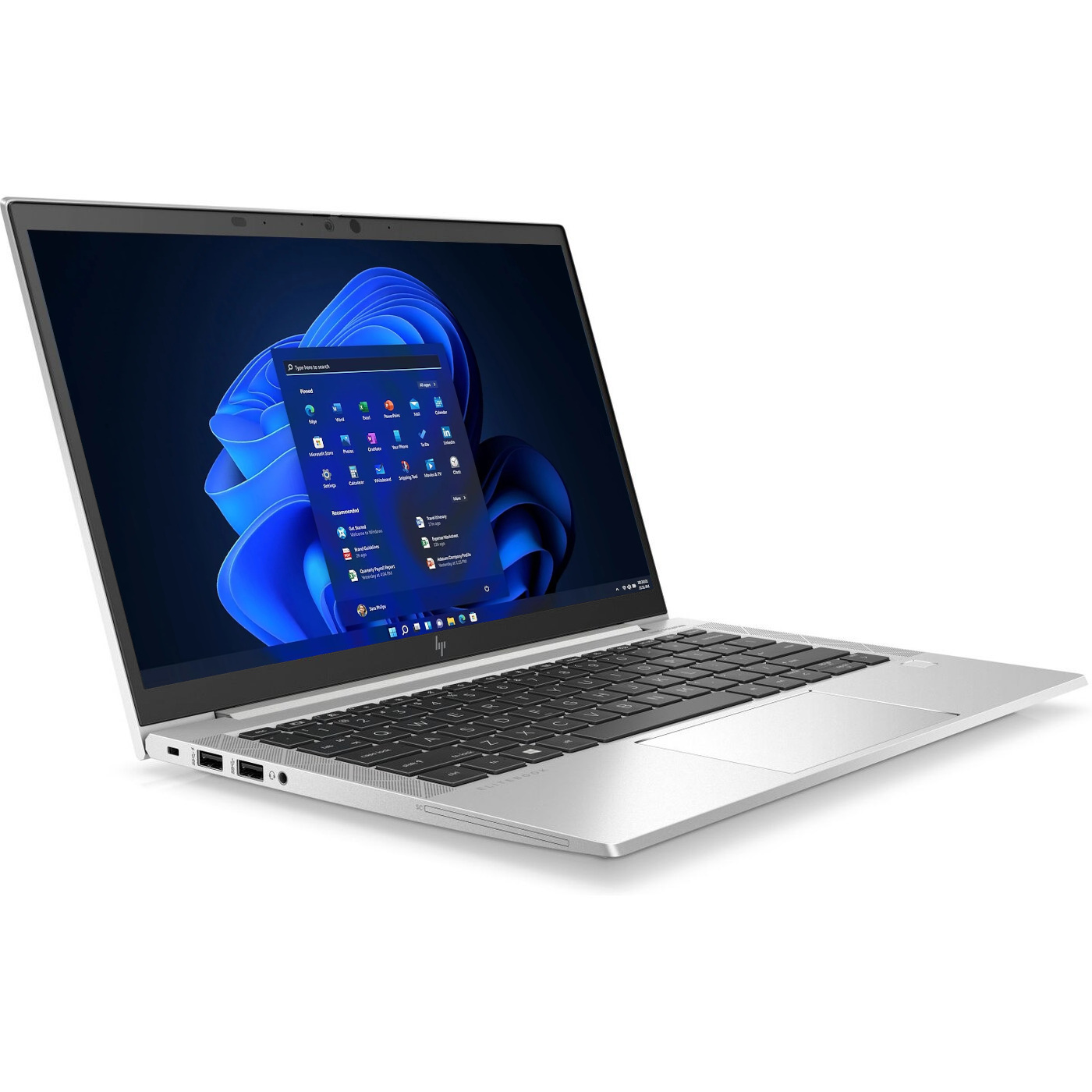 Ein silberner Laptop mit beleuchtetem Bildschirm, der Windows 11 zeigt.