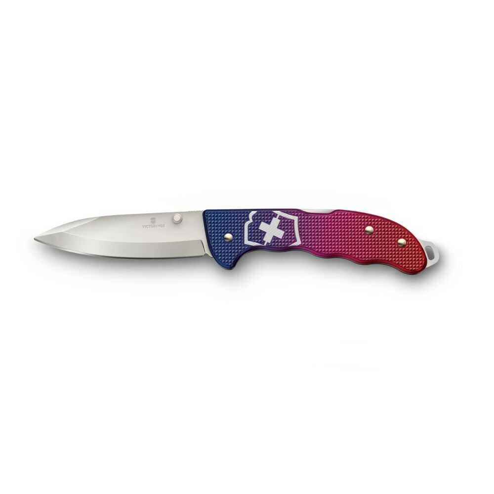 Gümüş bıçaklı, mavi-kırmızı saplı, beyaz haçlı çakı.