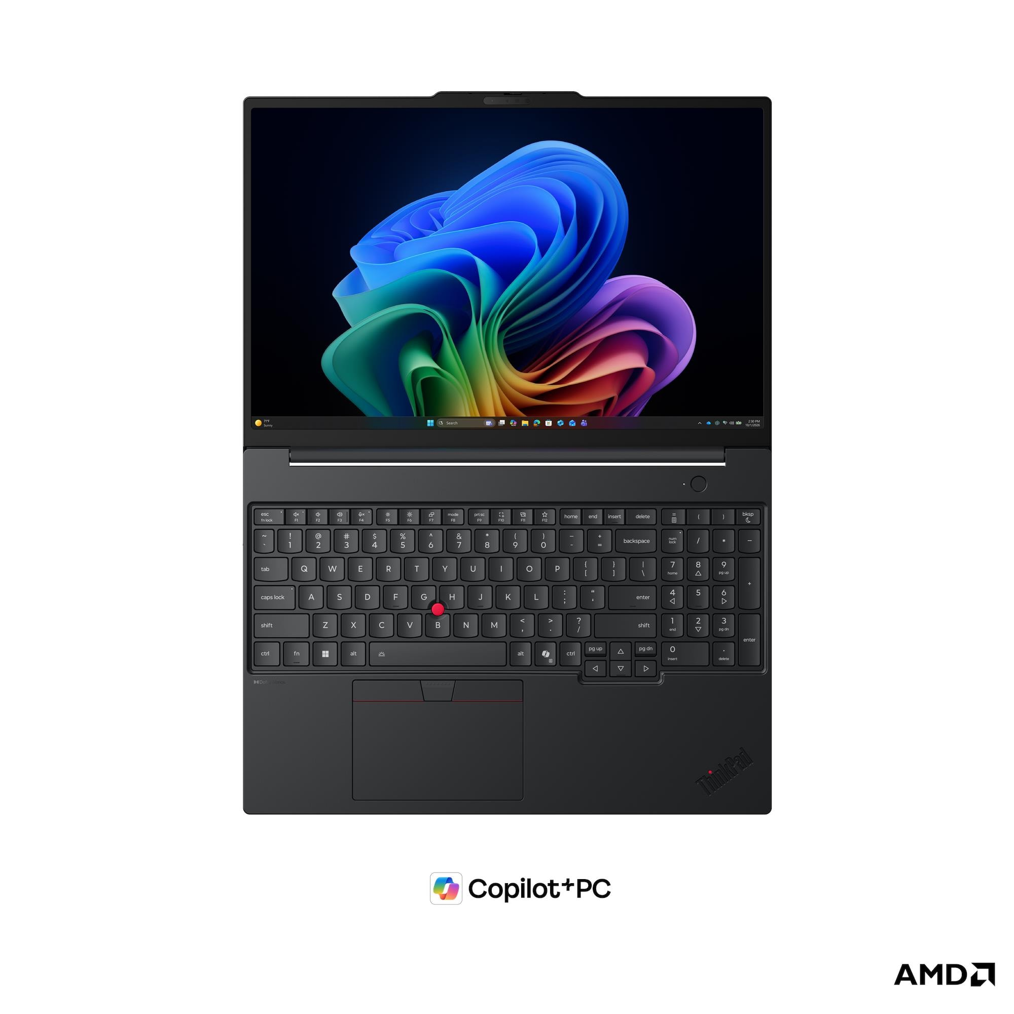 Un laptop nero con uno sfondo colorato e tastiera.