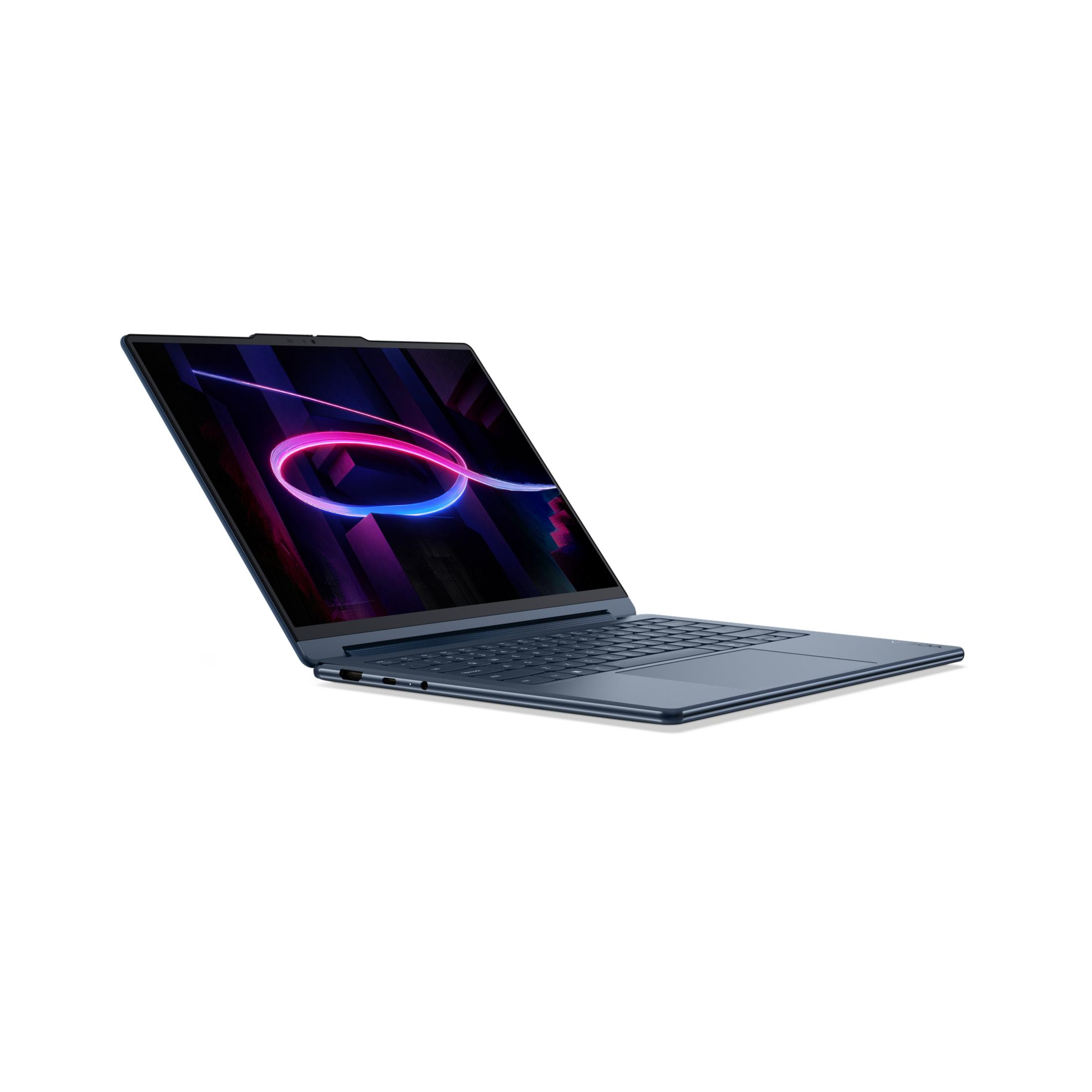 Un elegante portátil azul está abierto, mostrando un diseño abstracto de neón en su pantalla.