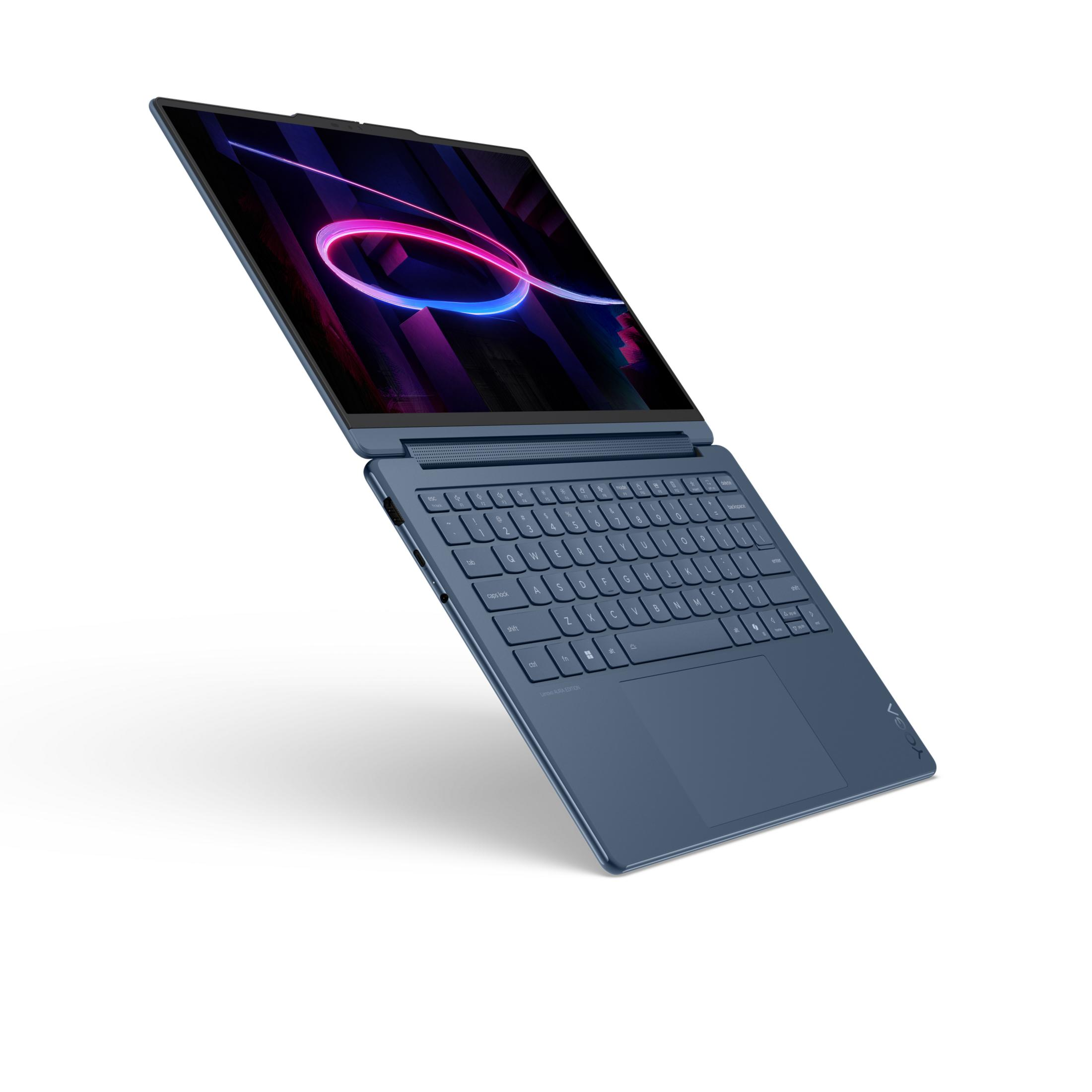 Un portátil azul con teclado iluminado y un fondo abstracto en la pantalla.