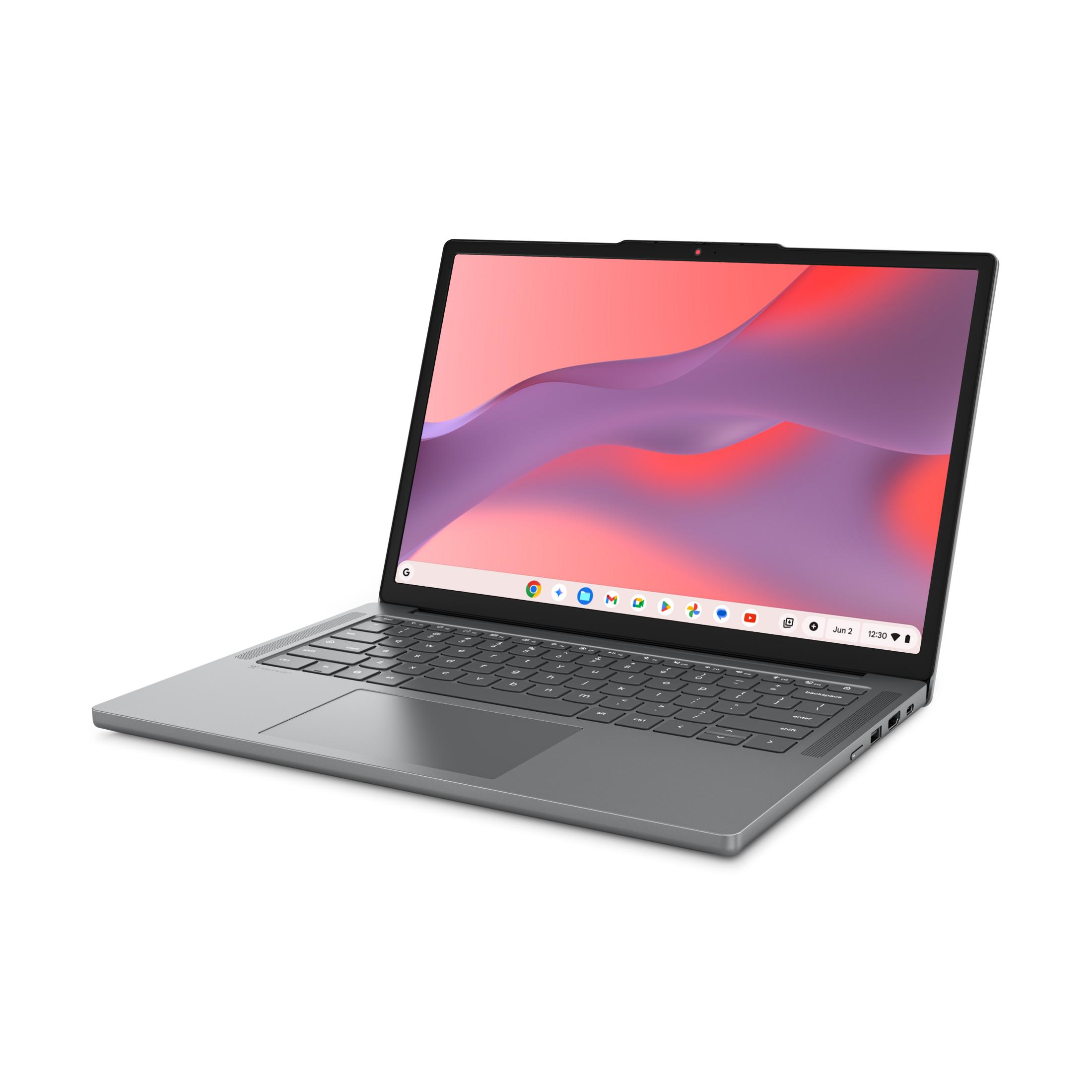 Ein silberner Laptop mit einem farbigen Hintergrund auf dem Bildschirm.