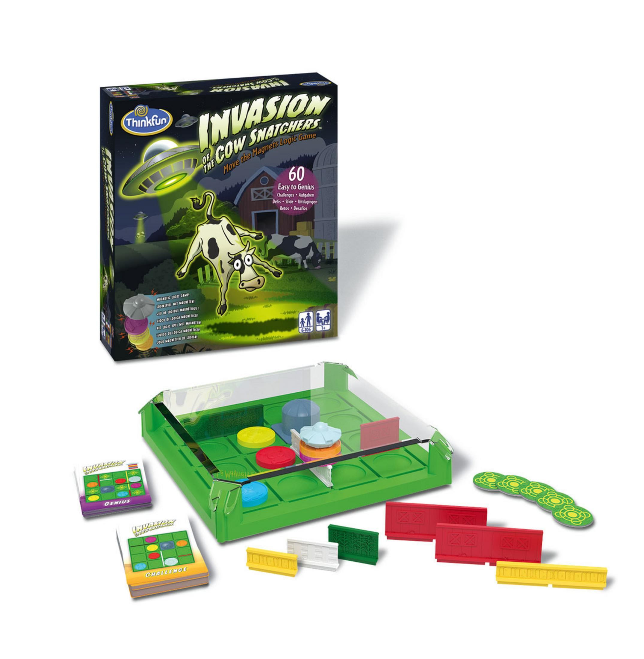 Tablero de juego con imanes coloridos, cartas y obstáculos.