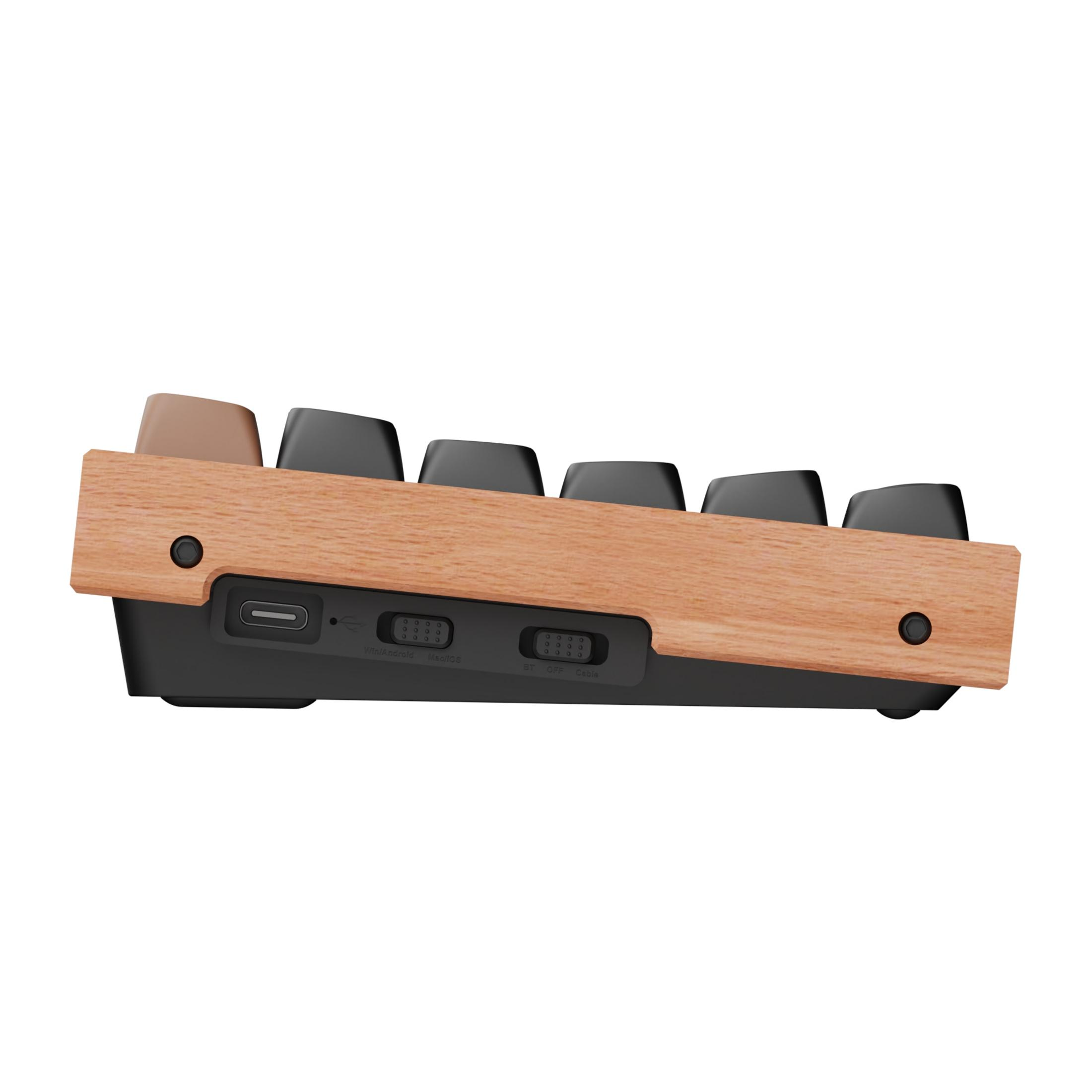 Nahaufnahme einer Tastaturseite mit Holzverkleidung und schwarzen Tasten.