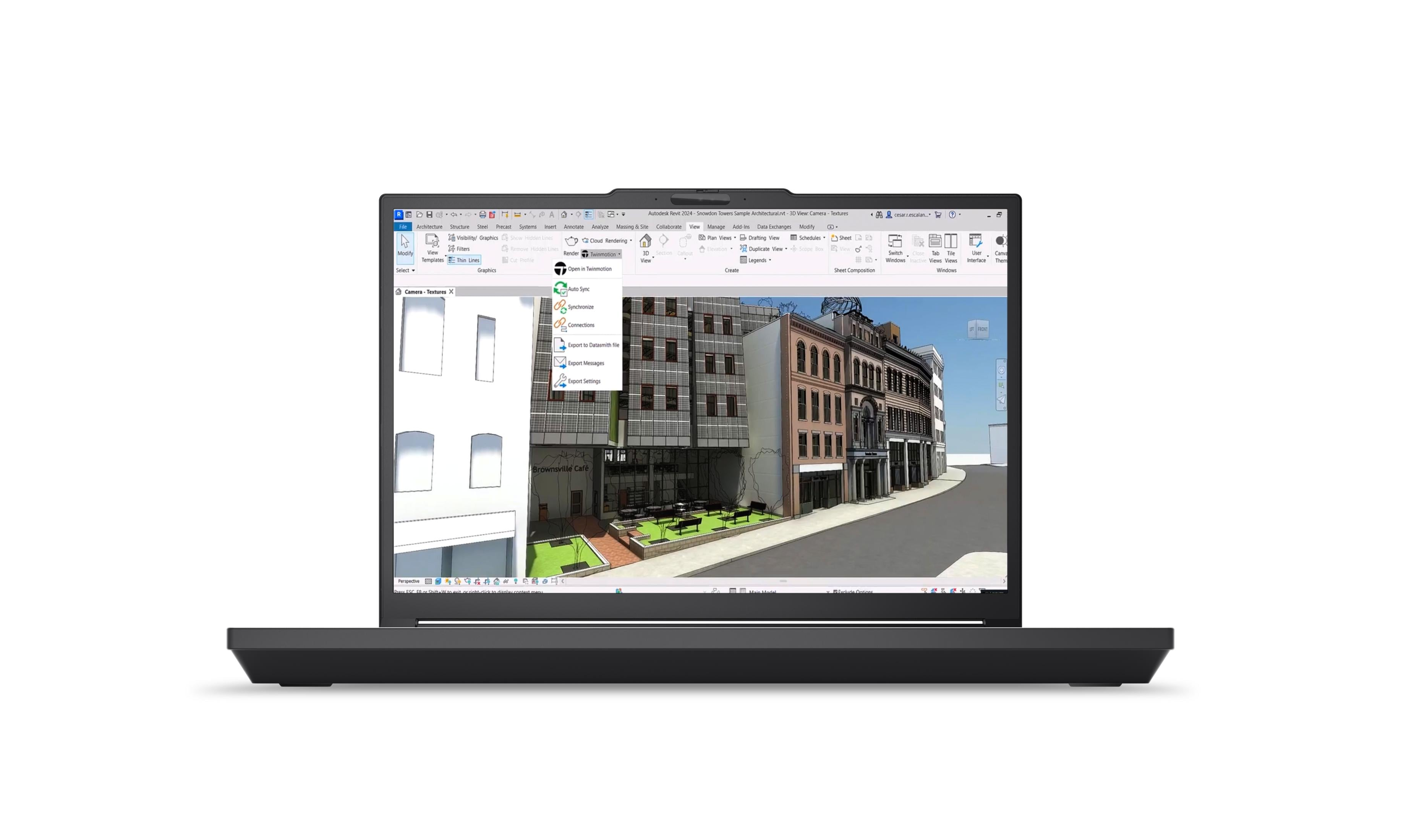 Laptop zeigt 3D-Architekturmodell von Gebäuden und Straßenszene.
