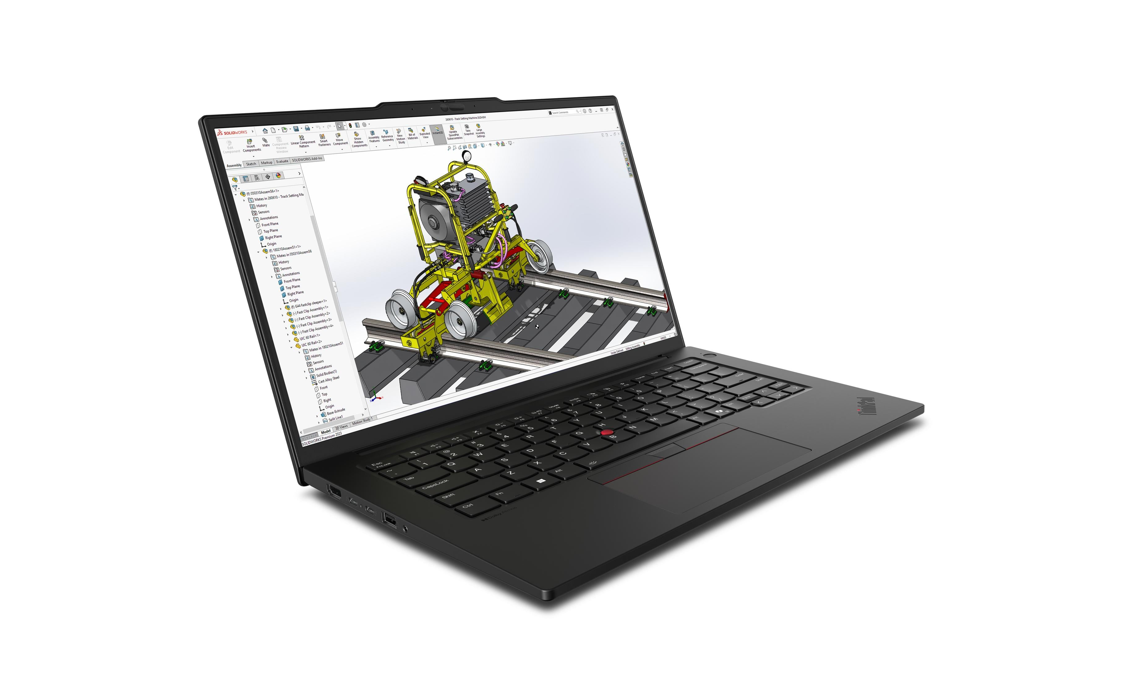 Schwarzer Laptop zeigt 3D-Modell einer gelben Maschine auf Schienen.