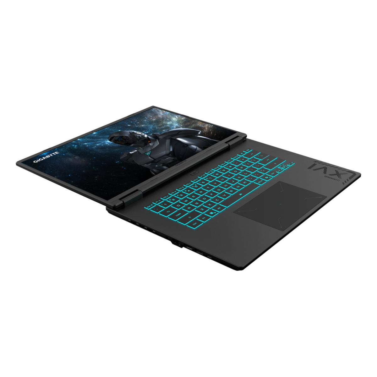 Un portátil negro con teclado iluminado y fondo de pantalla espacial.