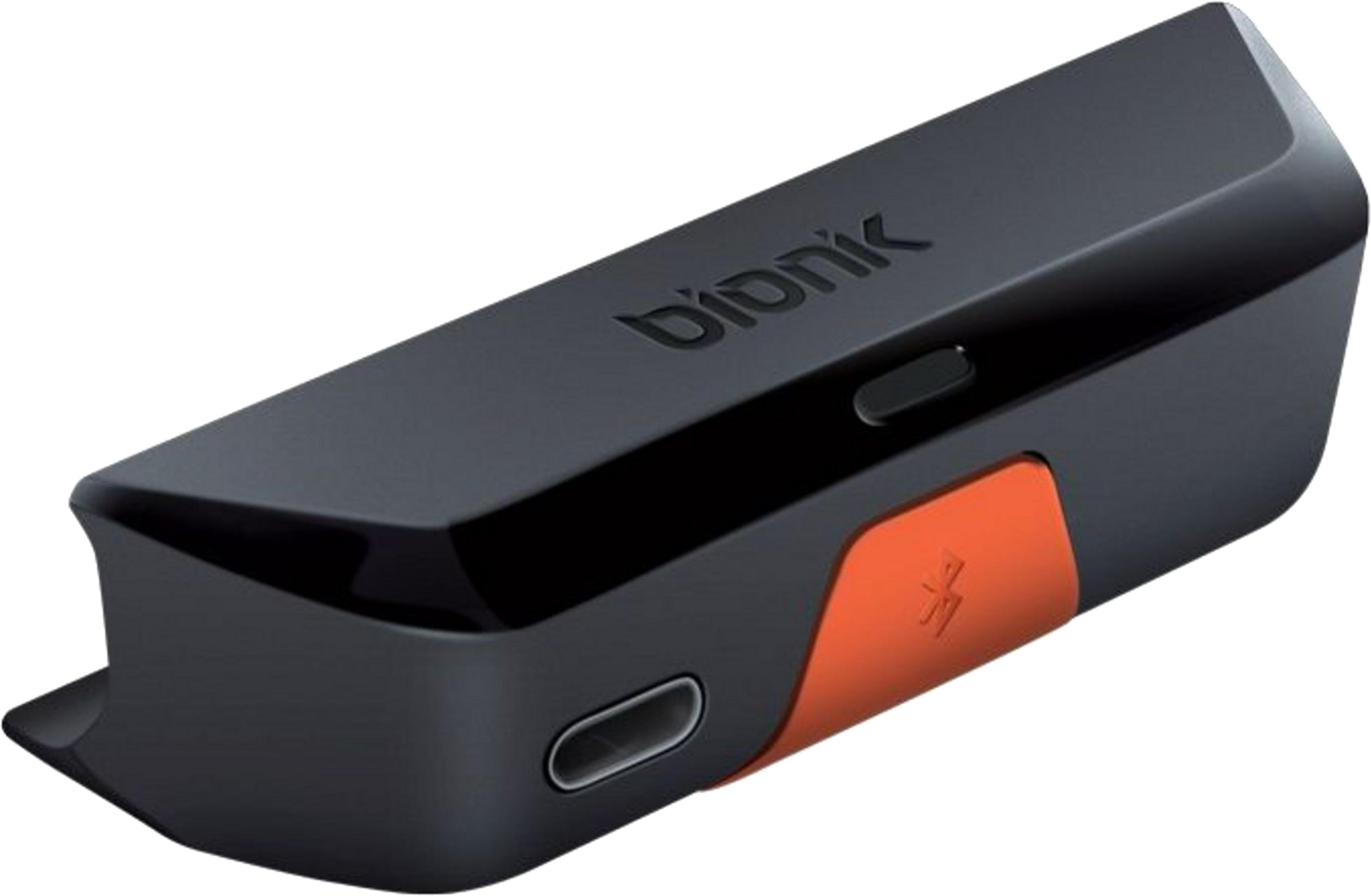 Czarny głośnik Bionic z pomarańczowym akcentem i symbolem Bluetooth.