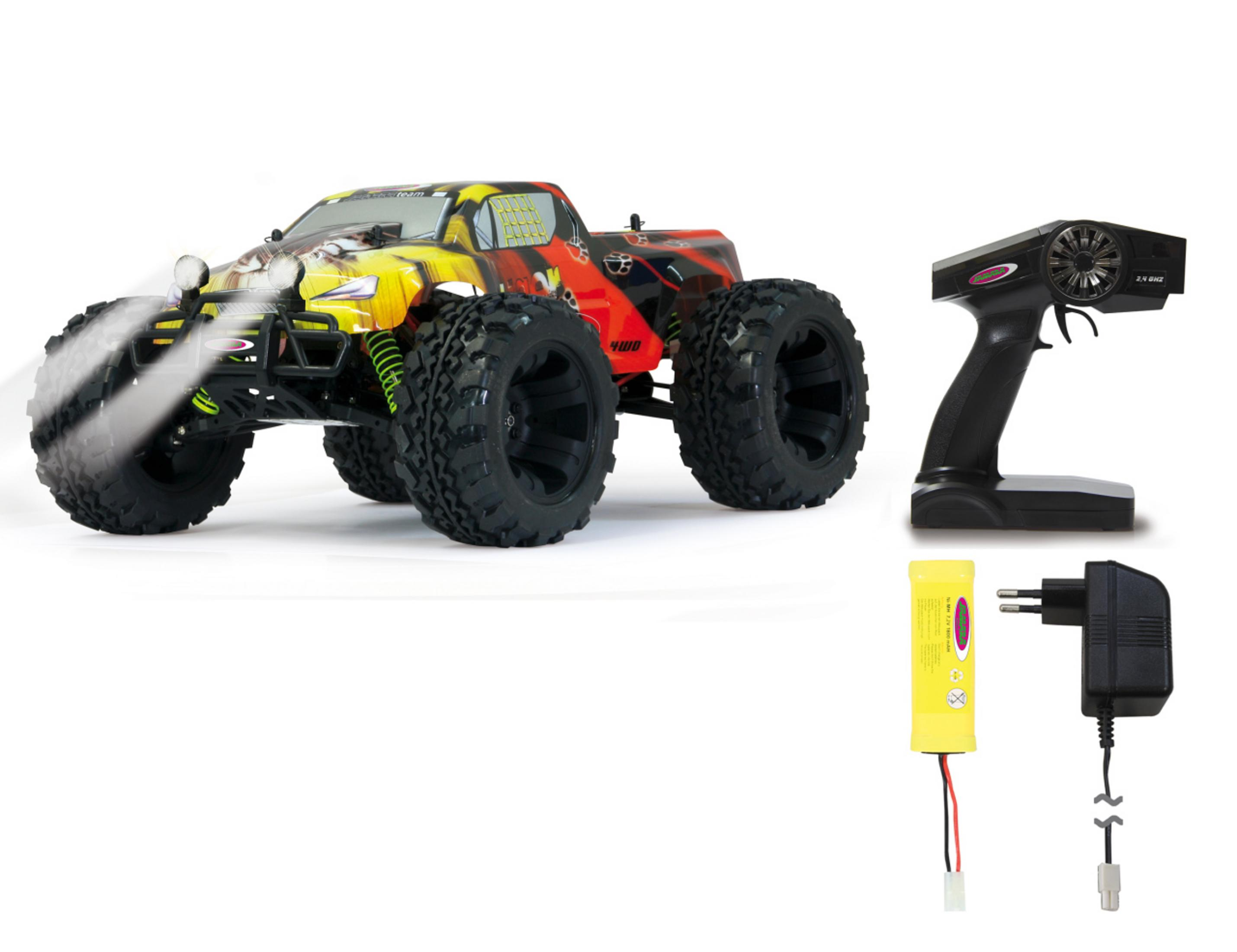 Ein gelbes und rotes ferngesteuertes Monstertruck-Auto mit großen Reifen, Fernbedienung, Akku und Ladegerät.