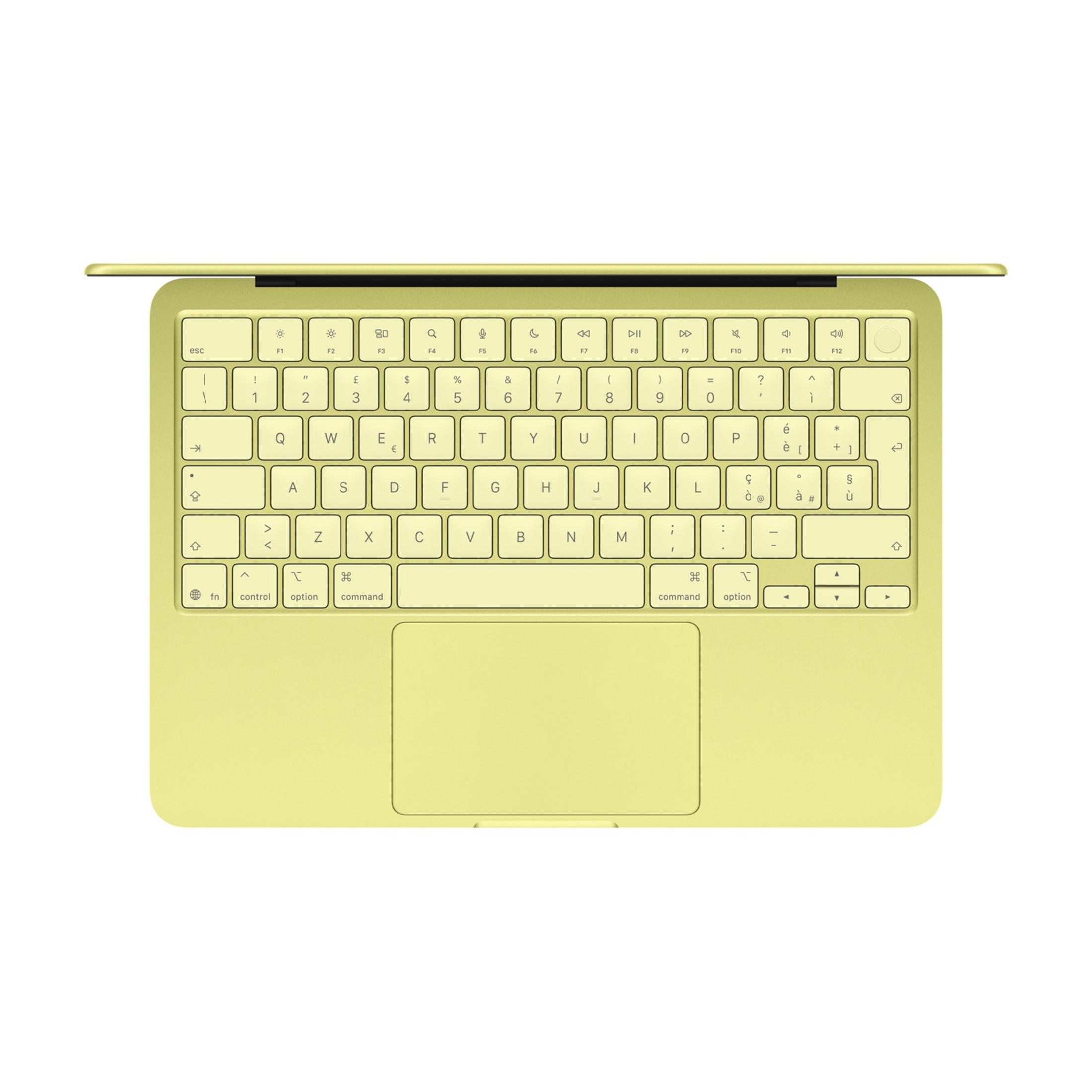 Jasnożółta klawiatura laptopa z touchpadem, widok z góry.