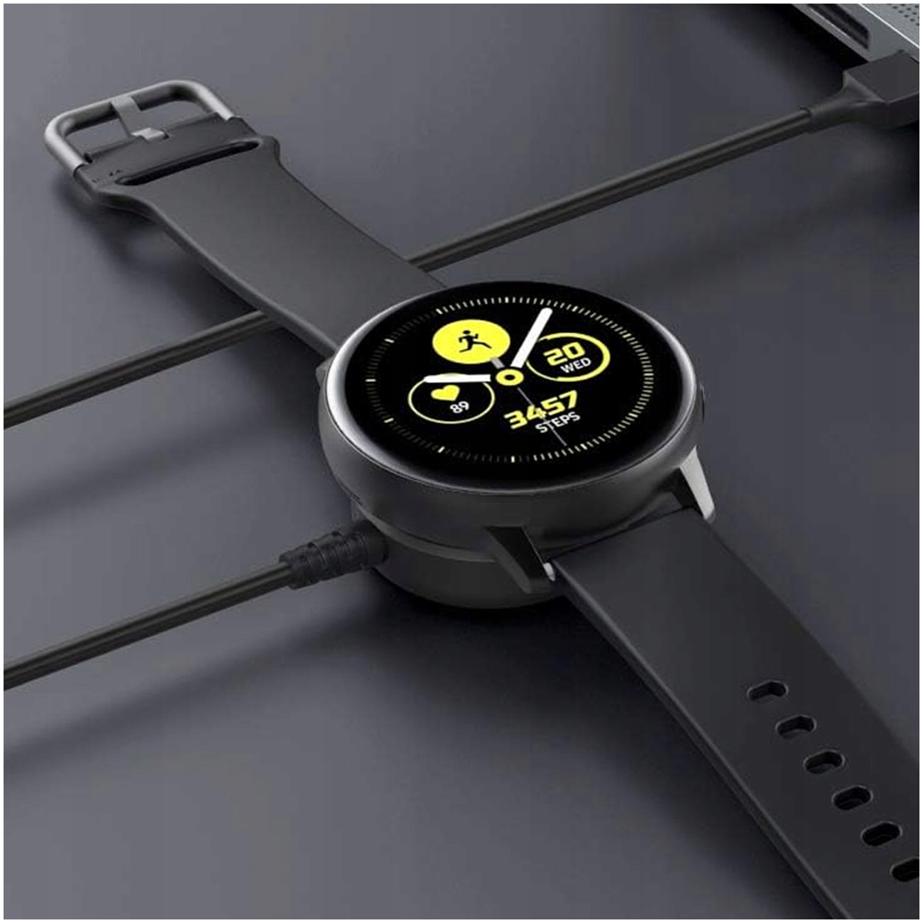 Czarny smartwatch się ładuje, pokazuje kroki i tętno.
