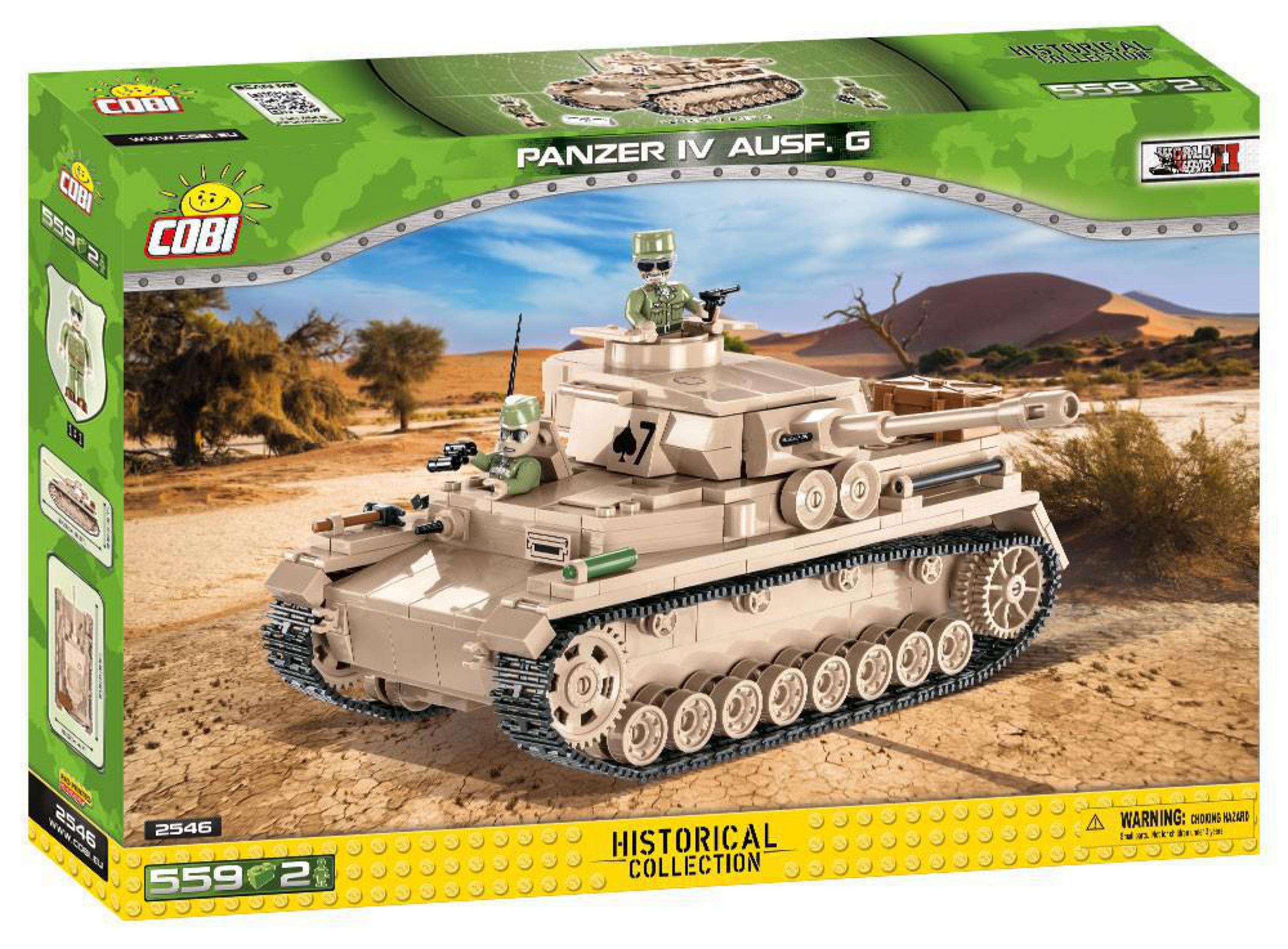 Ein Spielzeugpanzer IV Ausf. G vor einer Wüstenlandschaft auf einer Kartonschachtel.