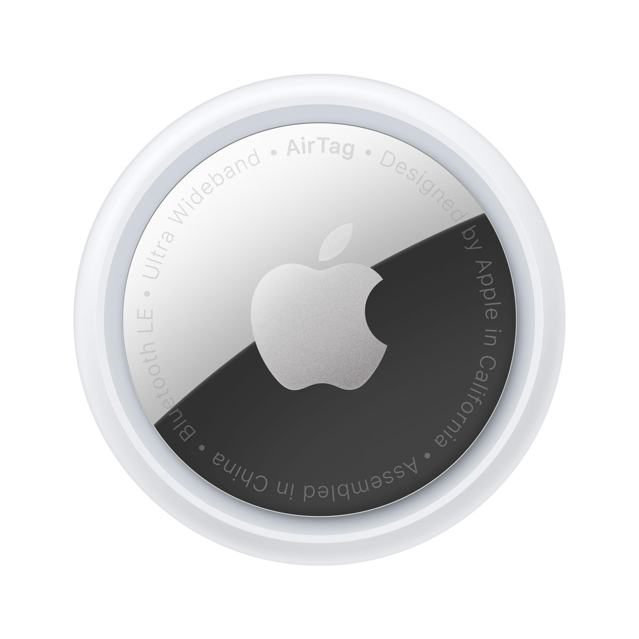 Apple AirTag blanco con logo plateado de Apple sobre fondo negro.