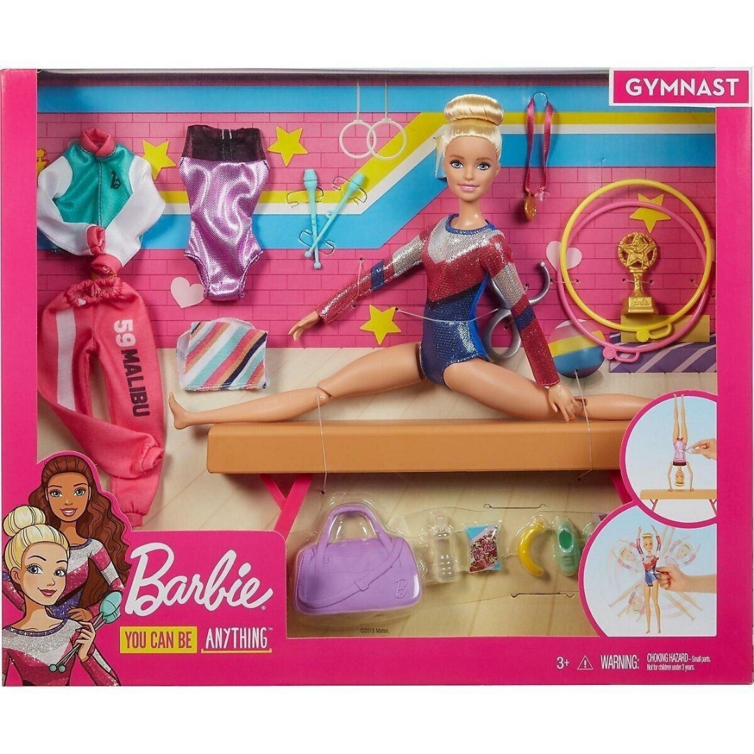 Barbie-Gymnastikpuppen-Set mit Barbie auf einem Schwebebalken, Trainingskleidung und Zubehör.