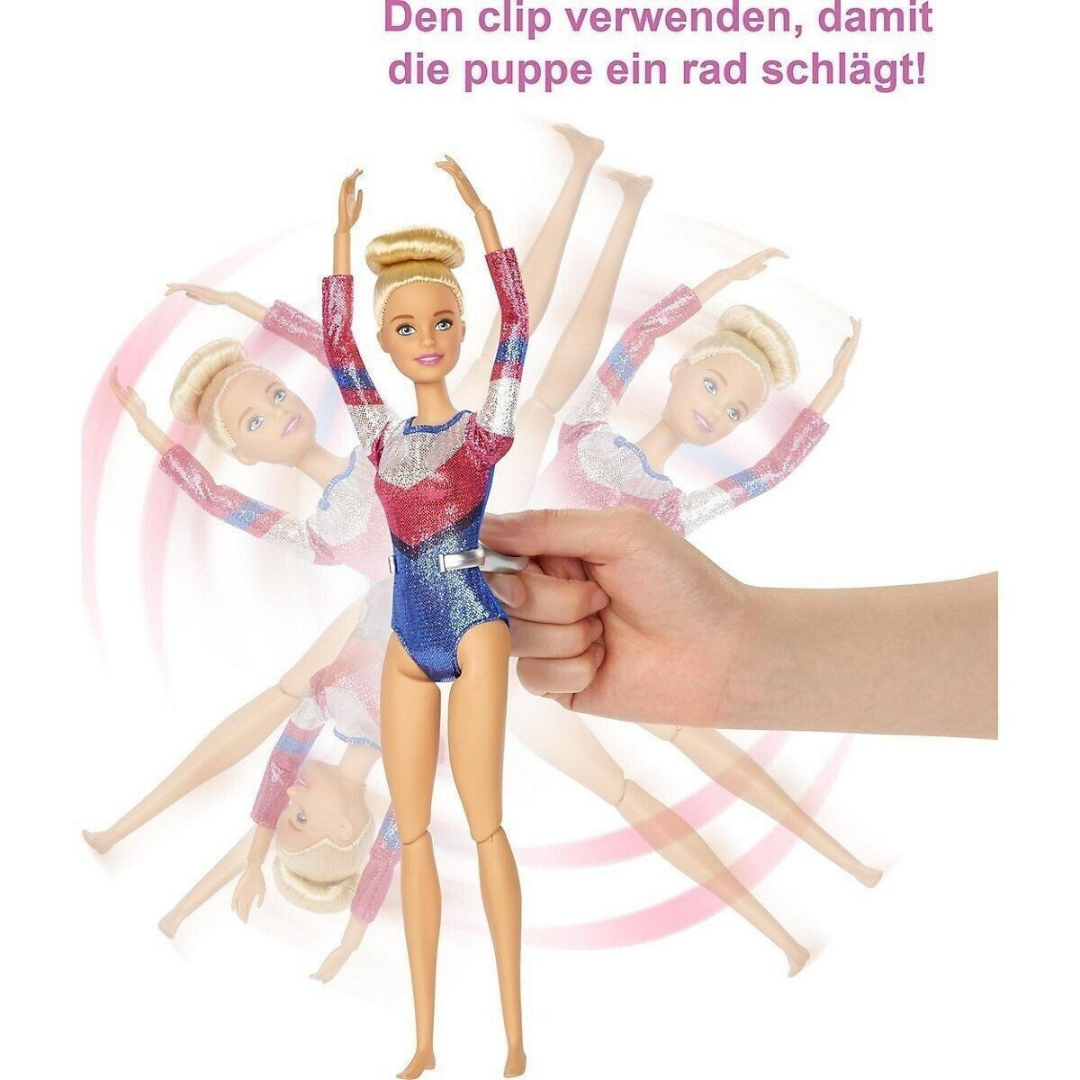 Eine Barbie-Puppe in einem rot-blau-weißen Turnanzug mit aufgestecktem Aufziehschlüssel.