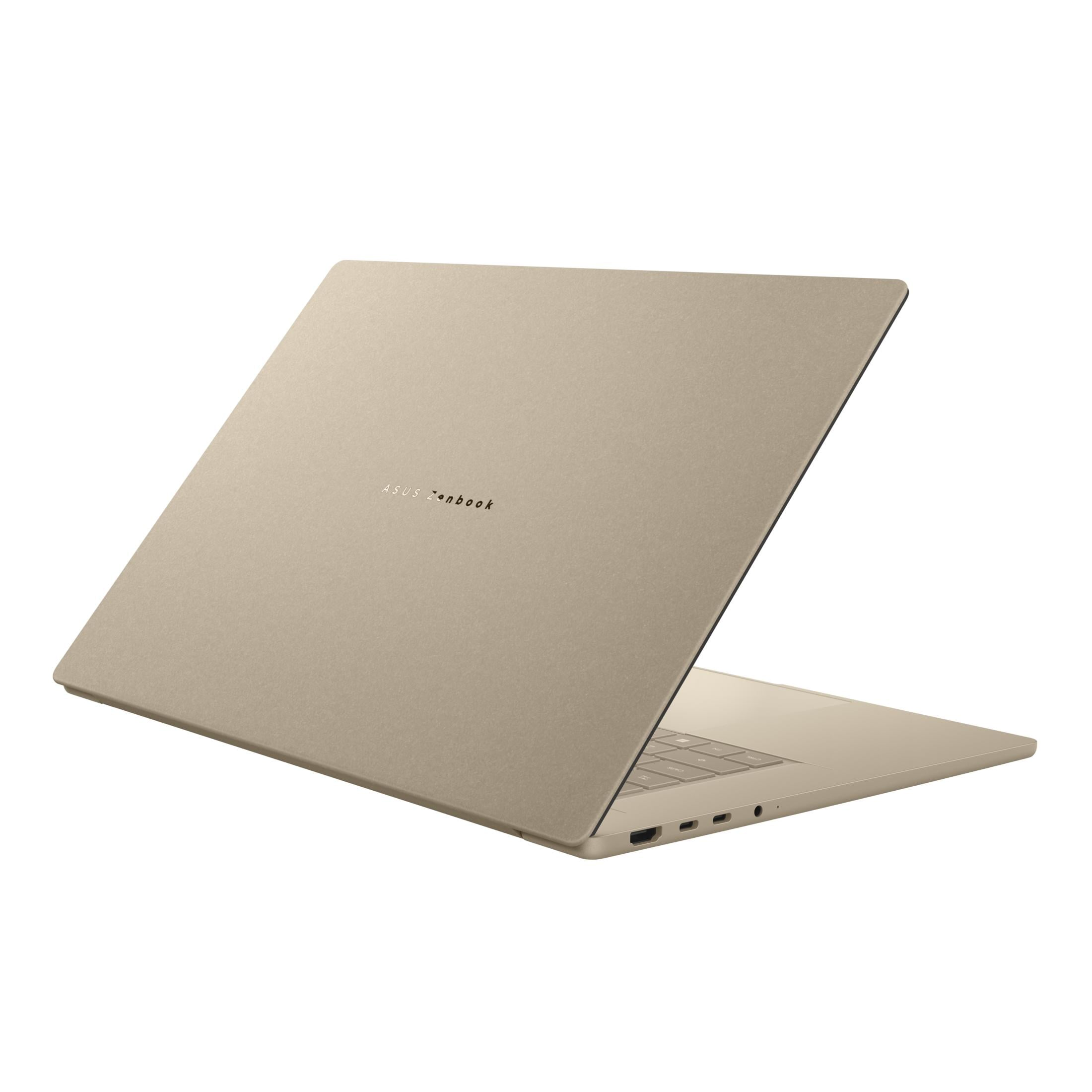 Ein geschlossener, goldfarbener Asus Zenbook Laptop auf weißem Hintergrund.