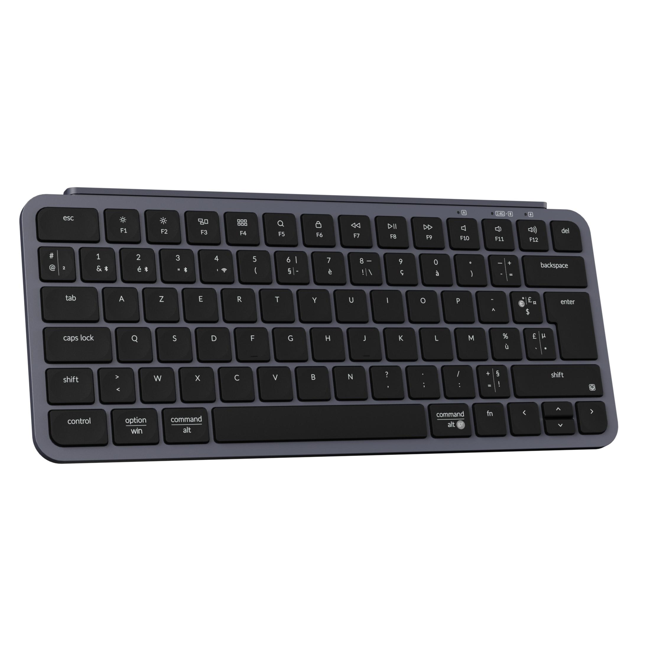 Eine graue Tastatur mit schwarzen Tasten, die auf weißem Hintergrund platziert ist.