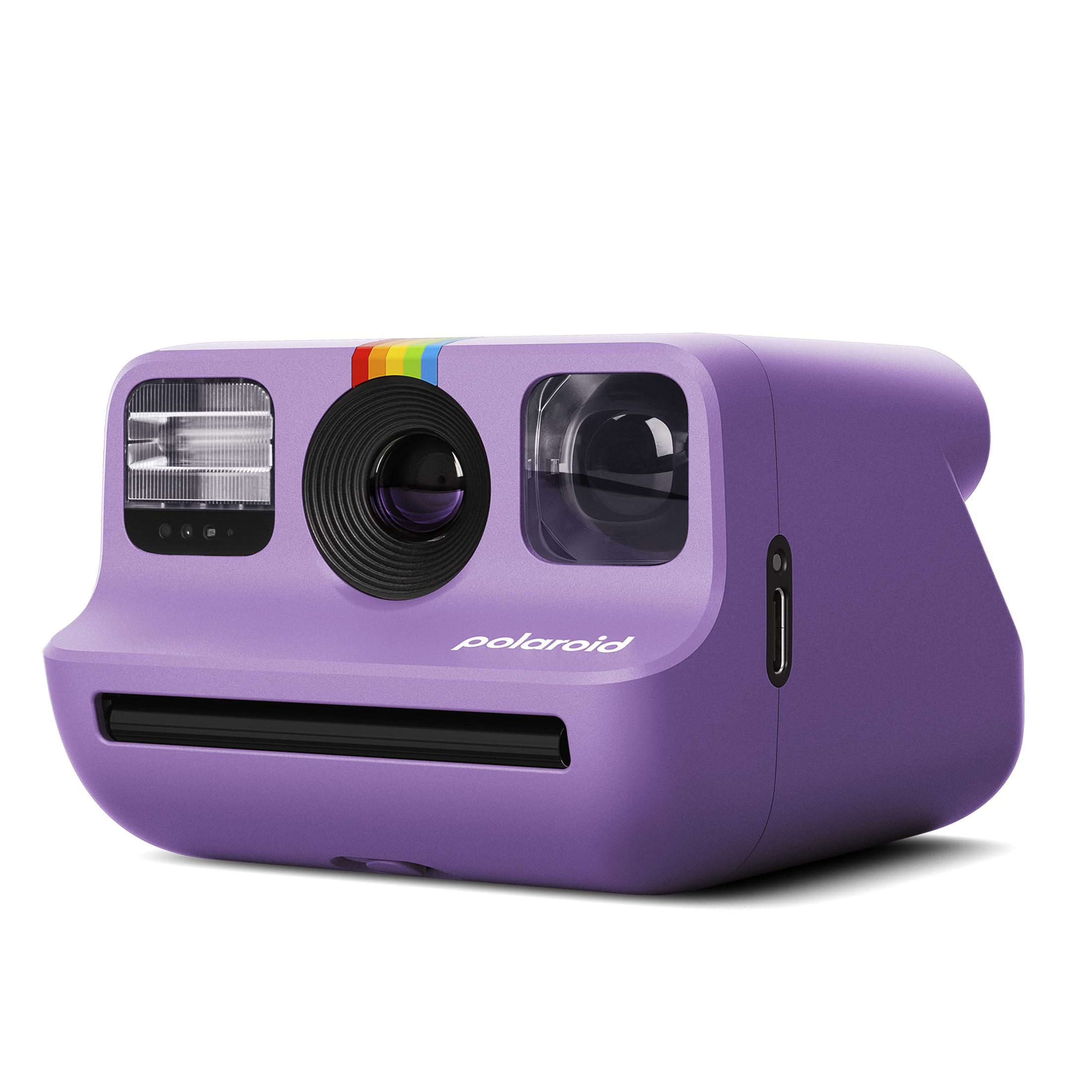 Fotocamera istantanea Polaroid viola con dettaglio arcobaleno e lente.