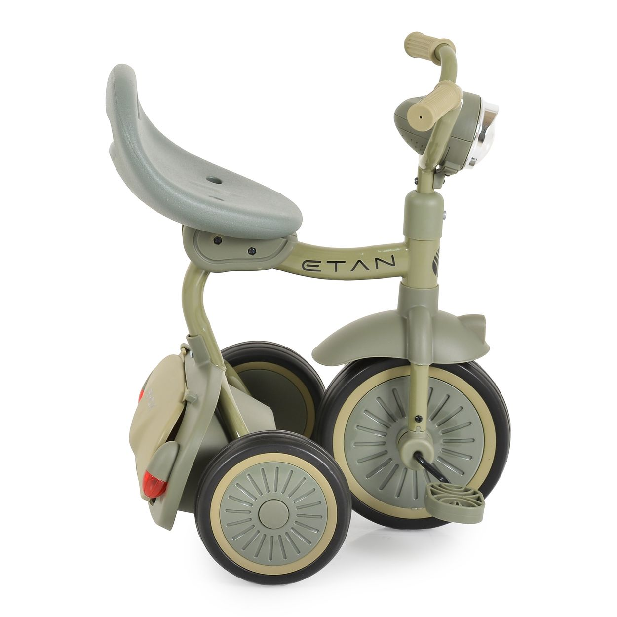 Ein grünes und beiges Dreirad für Kinder mit Scheinwerfer und Staufach.