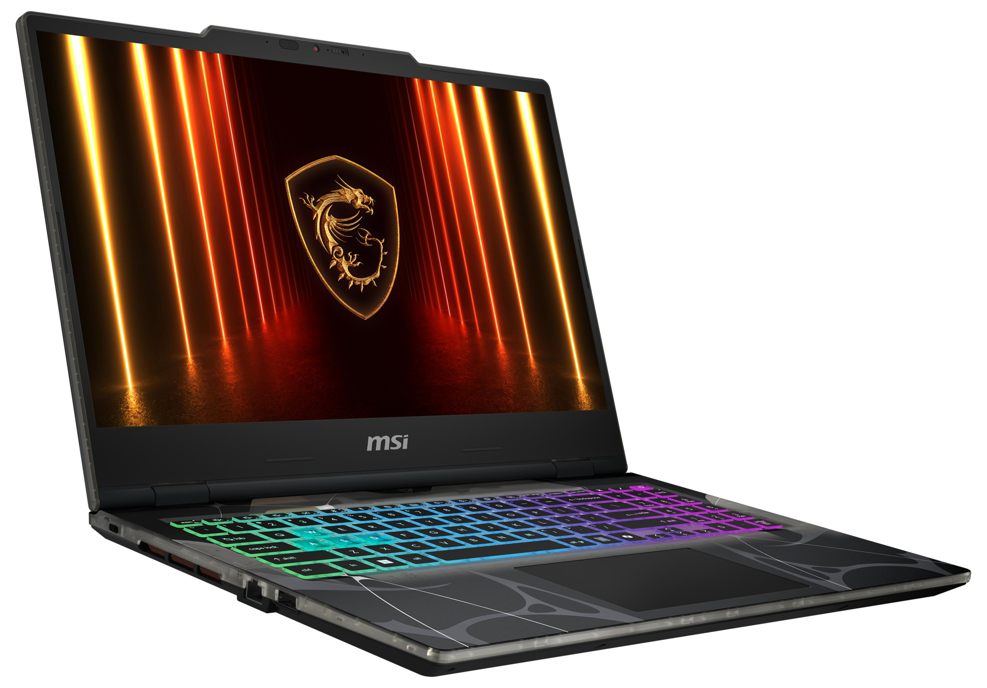 Ein offener Laptop mit beleuchteter Tastatur und MSI-Logo auf dem Bildschirm.