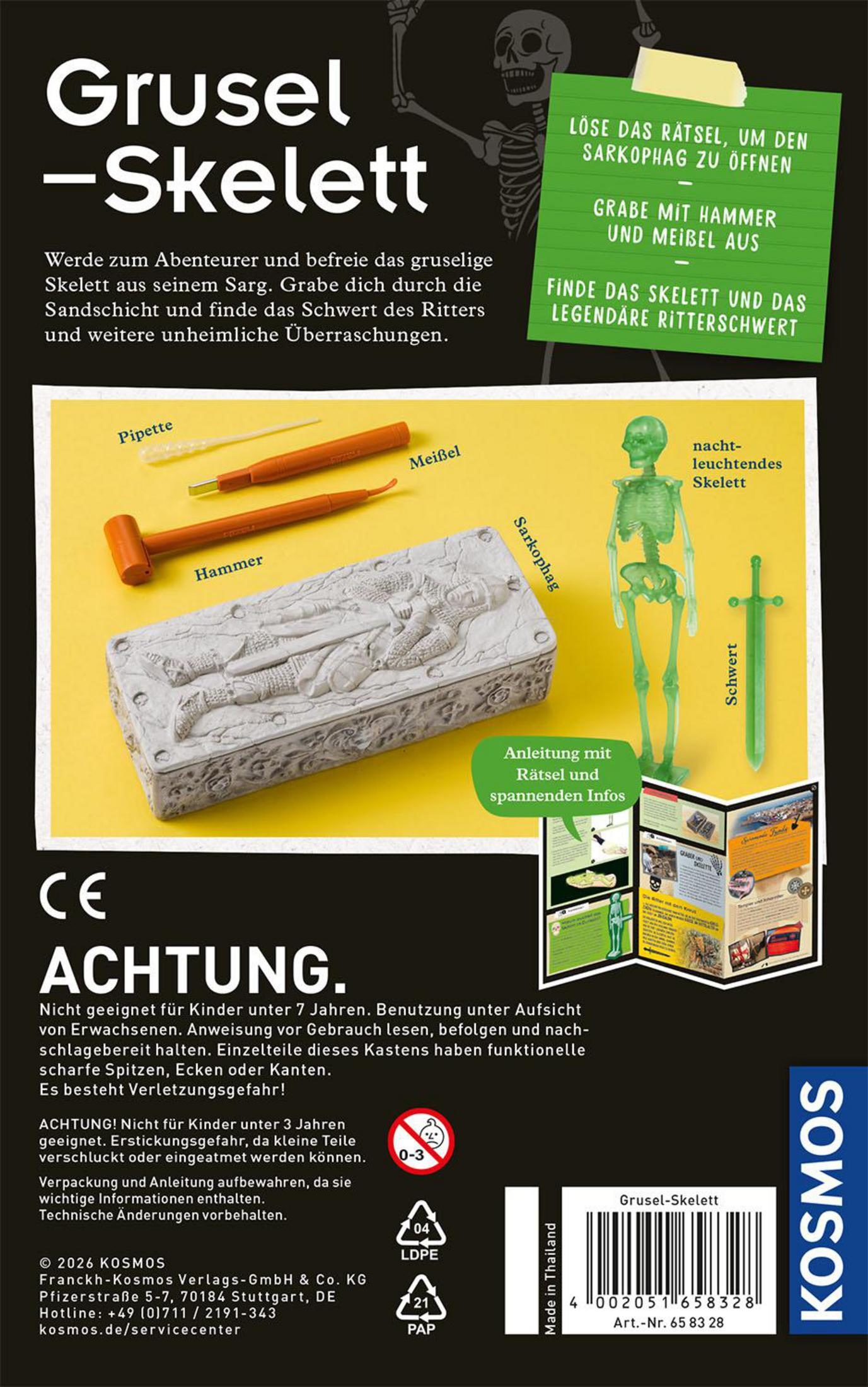 Ein Spielzeugpaket mit einem Skelett-Sarg, Hammer, Meißel und Pipette.