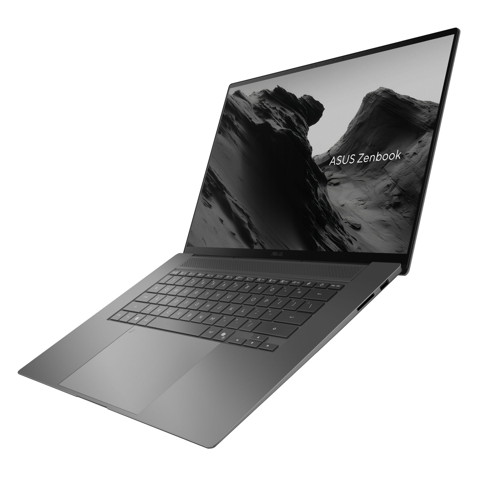 Grauer ASUS Zenbook Laptop mit beleuchteter Tastatur und Berglandschaft auf dem Bildschirm.