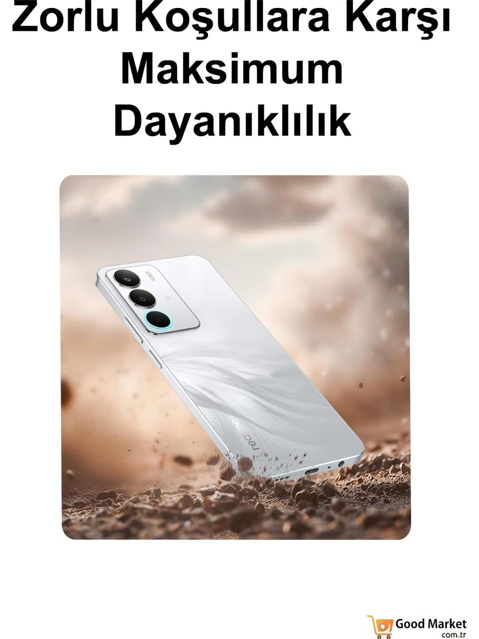 Beyaz bir akıllı telefon havada süzülüyor, engebeli, kayalık araziye düşüyor.