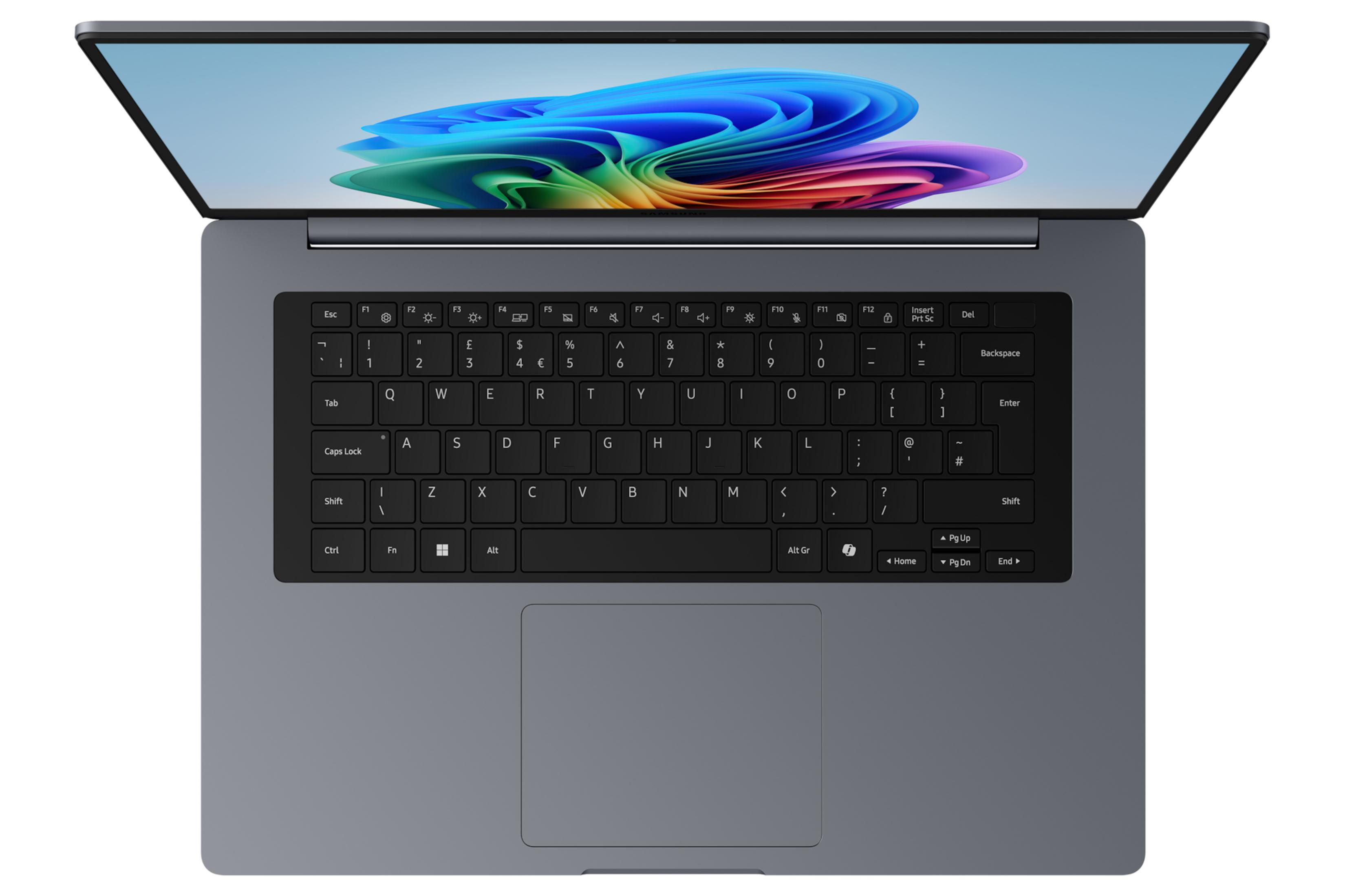 Ein graues Laptop mit geöffnetem Bildschirm und Tastatur. Der Bildschirm zeigt ein buntes Muster.