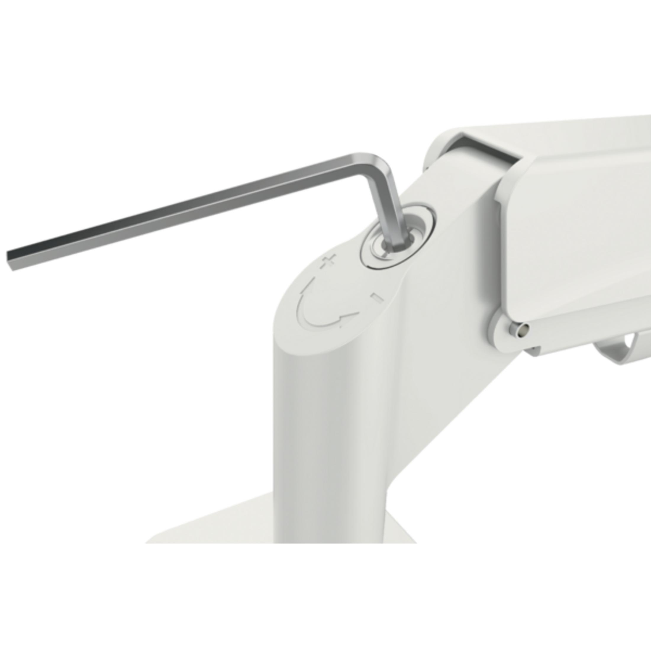 Ein weißer Arm mit einem Inbusschlüssel, der in eine Öffnung eingesetzt ist.