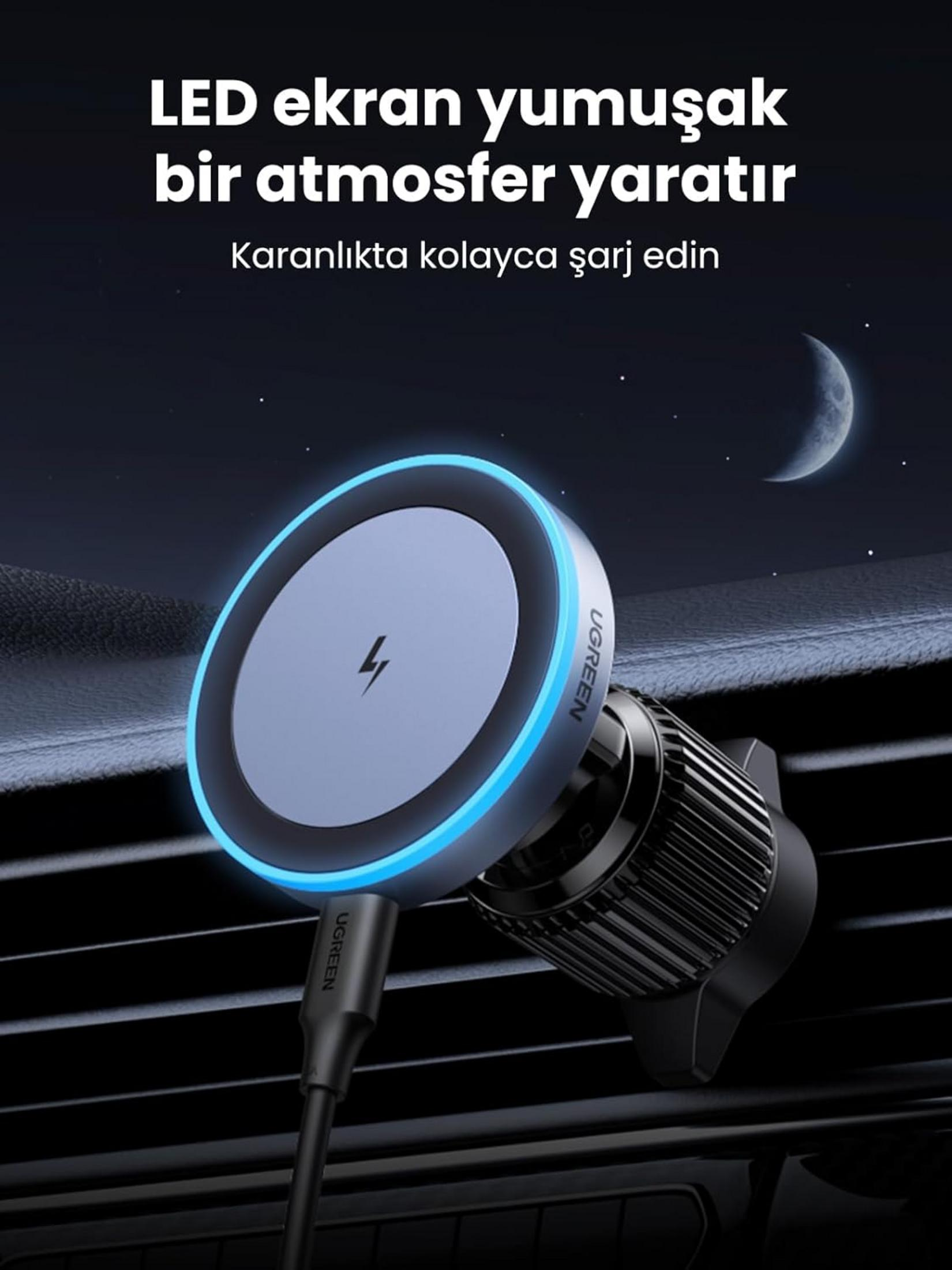 Geceleri arabada şimşek sembollü, mavi ışıklı kablosuz şarj standı.