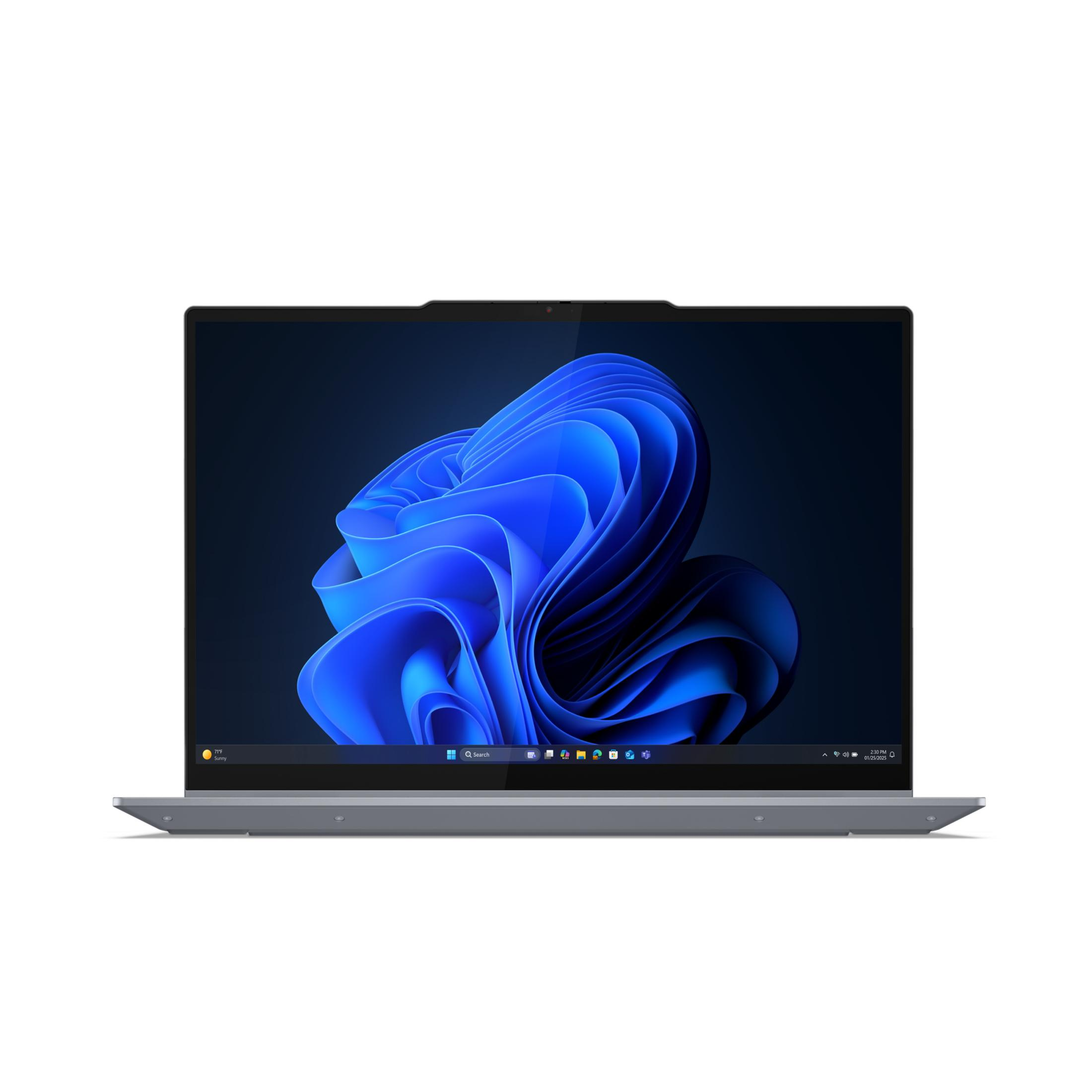 Laptop z niebieskim, falistym tłem na białym tle.