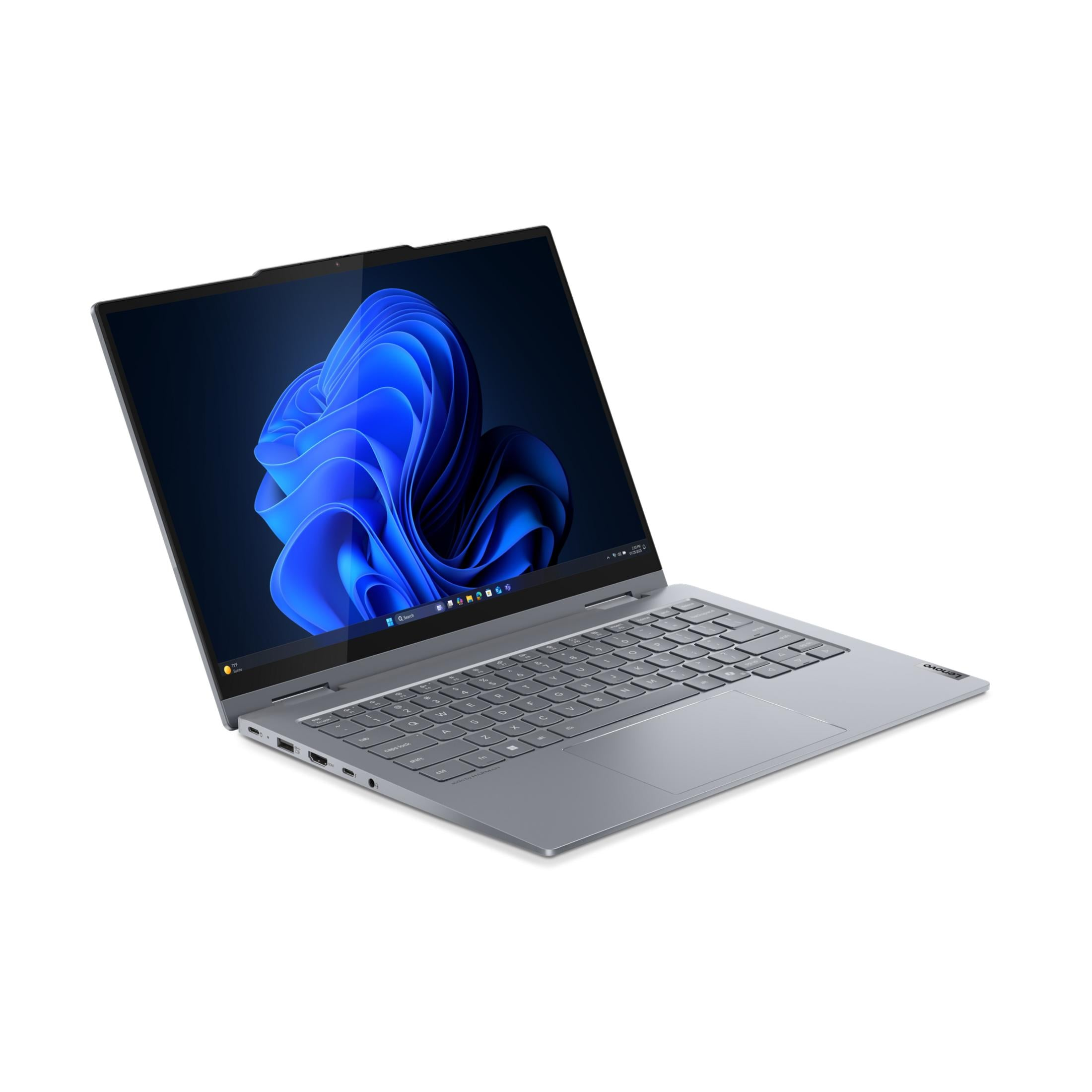 Srebrny laptop z otwartym ekranem, wyświetlający logo Windows 11.
