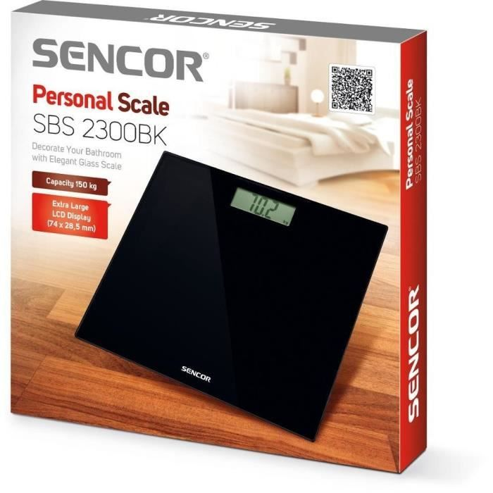 Schwarze Glaswaage mit LCD-Display, zeigt 70,2 kg an, auf Holzboden.