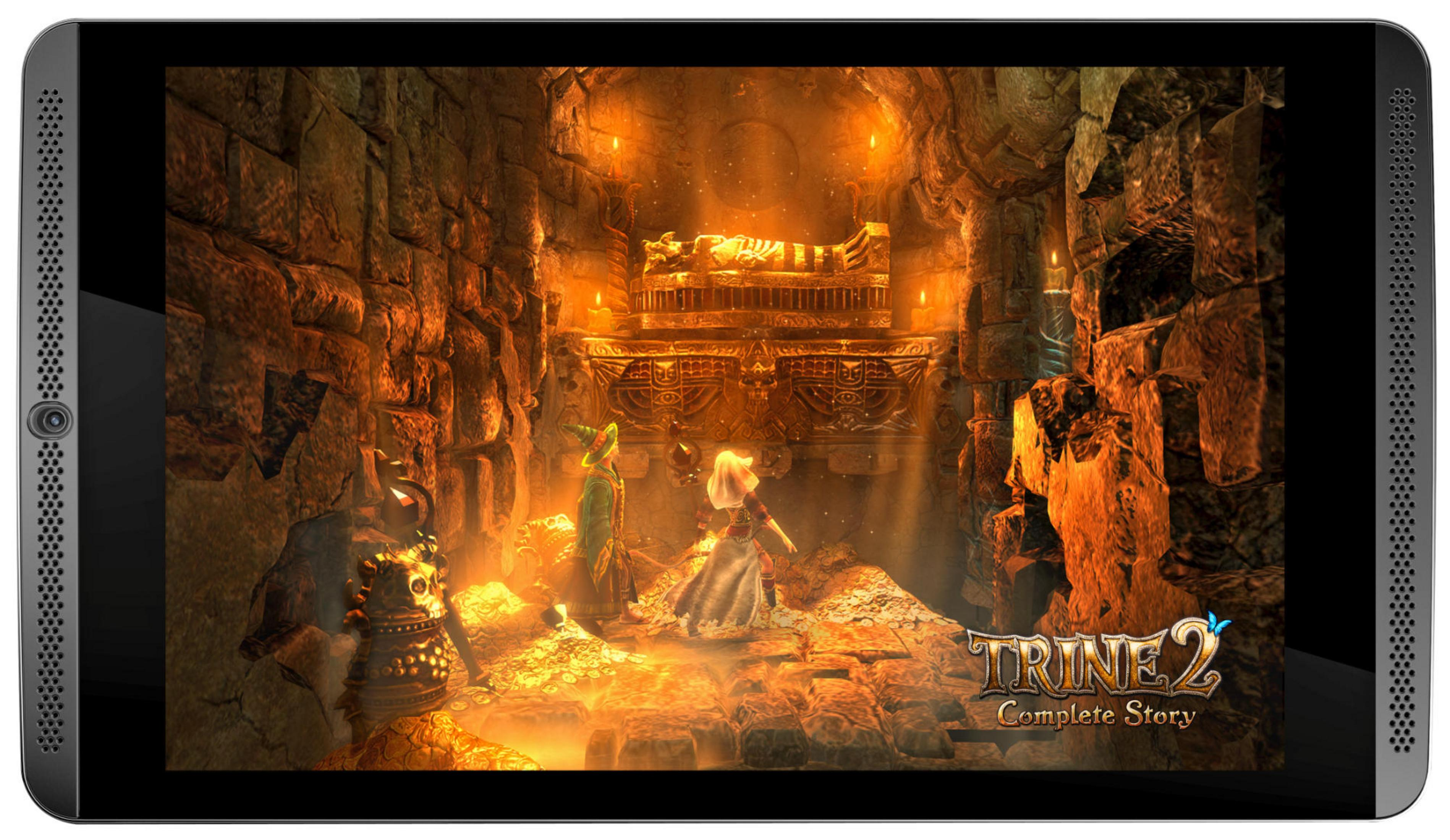 Zwei Charaktere stehen vor einer goldenen Truhe in einer Höhle.
