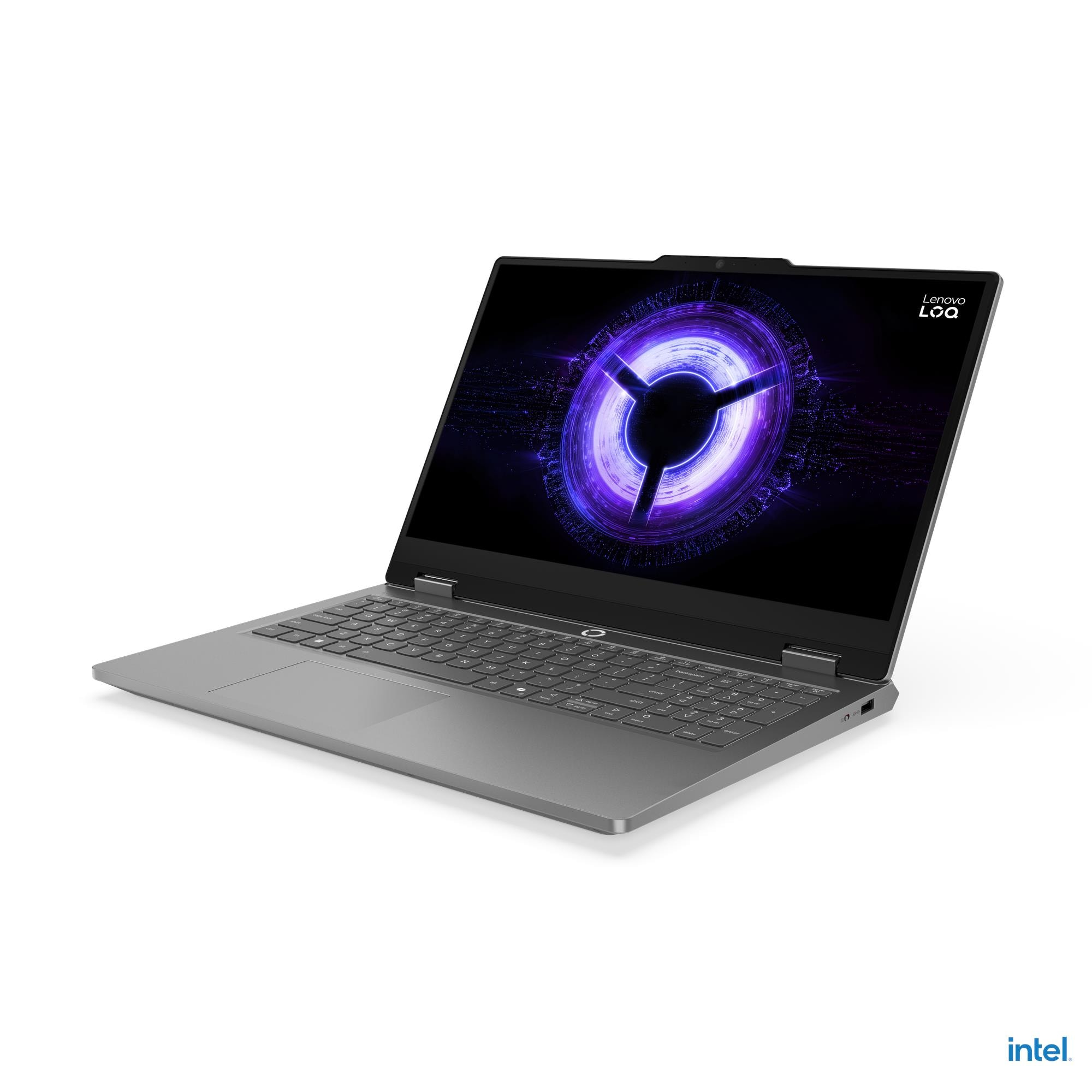 Un laptop grigio aperto mostra un'immagine di sfondo viola vibrante sullo schermo.