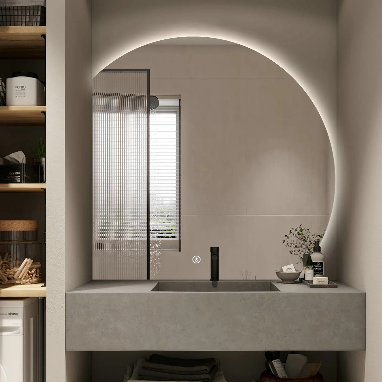 Een moderne badkamer met betonnen wastafel, ronde verlichte spiegel en planken.