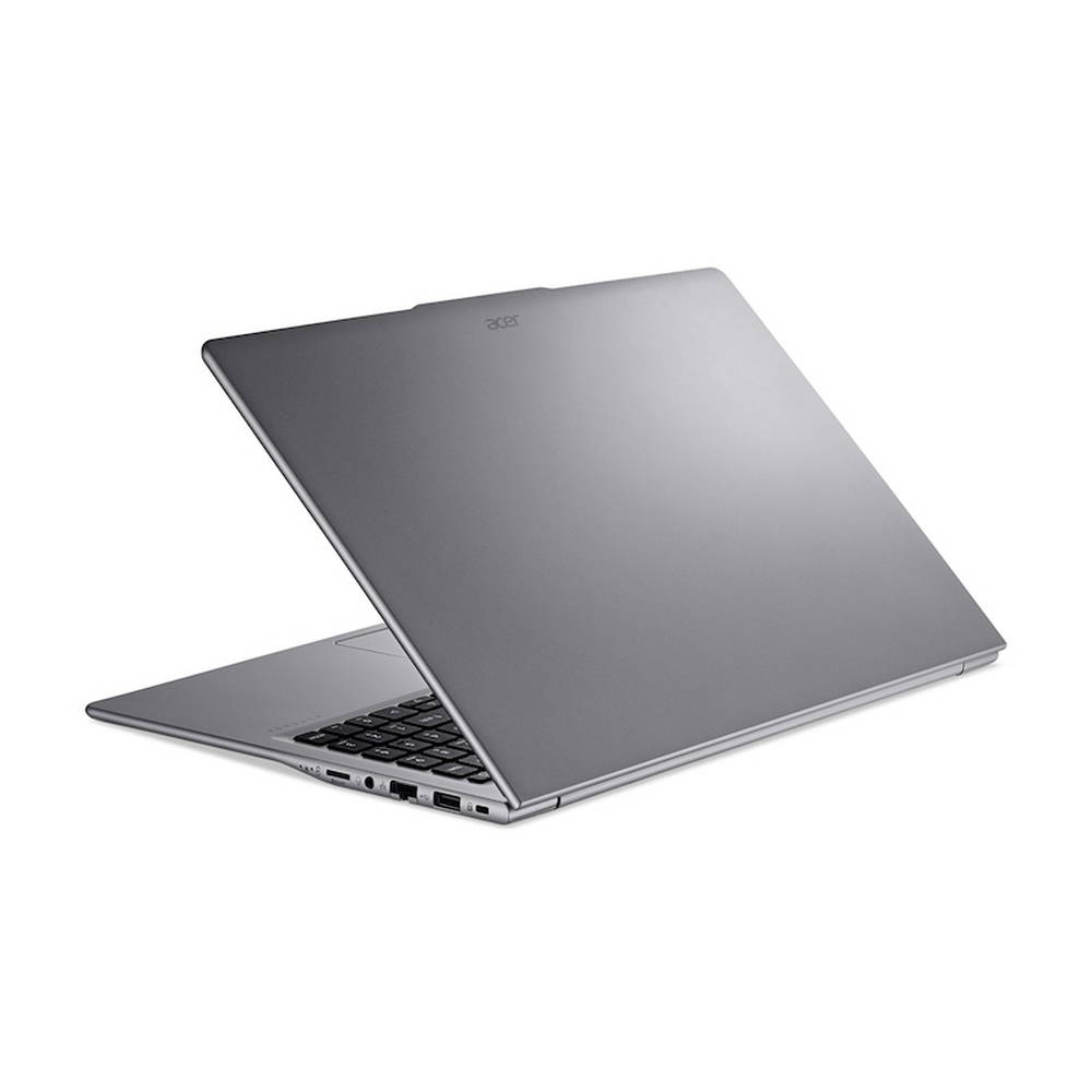 Laptop Acer grigio con coperchio aperto, tastiera visibile.