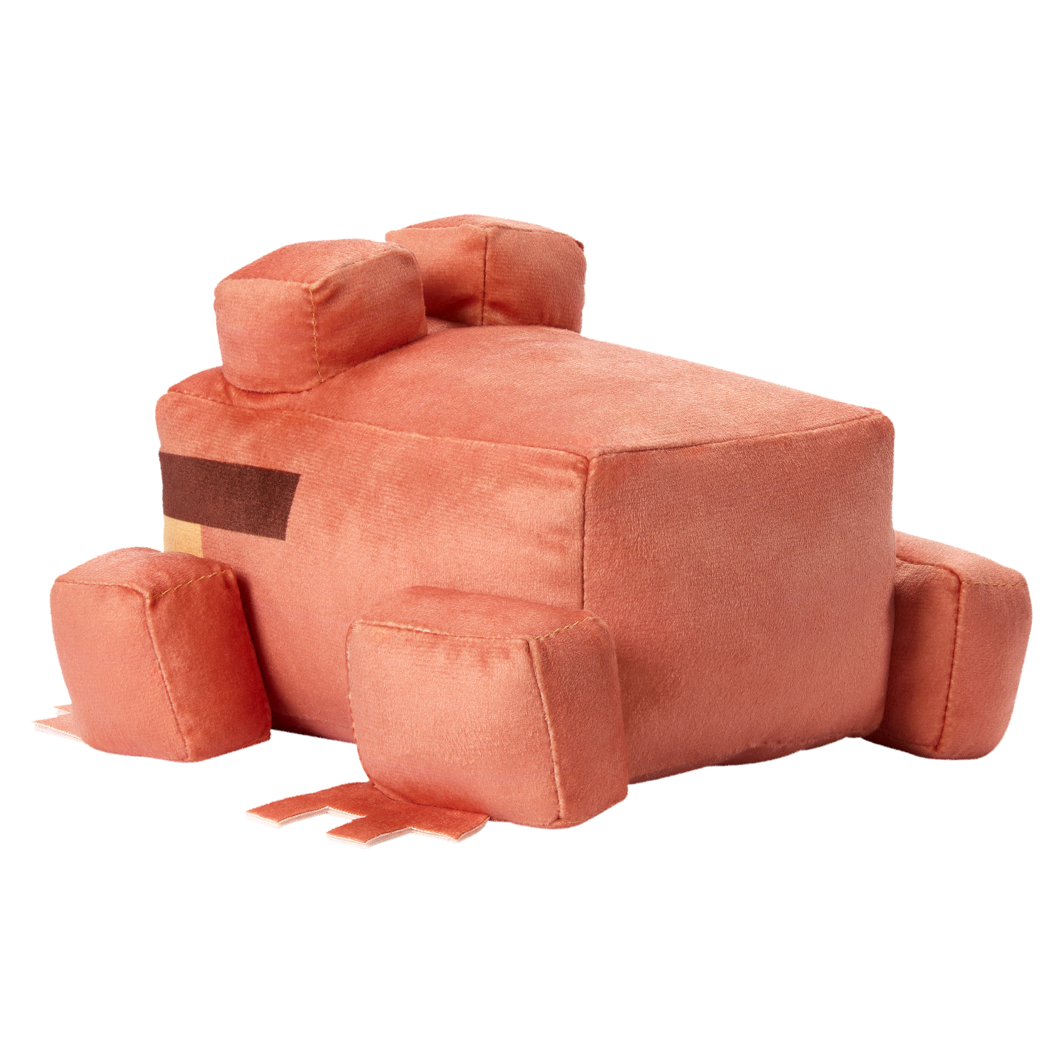 Un peluche color coral, de formas cuadradas, con detalles marrones, tumbado boca abajo.