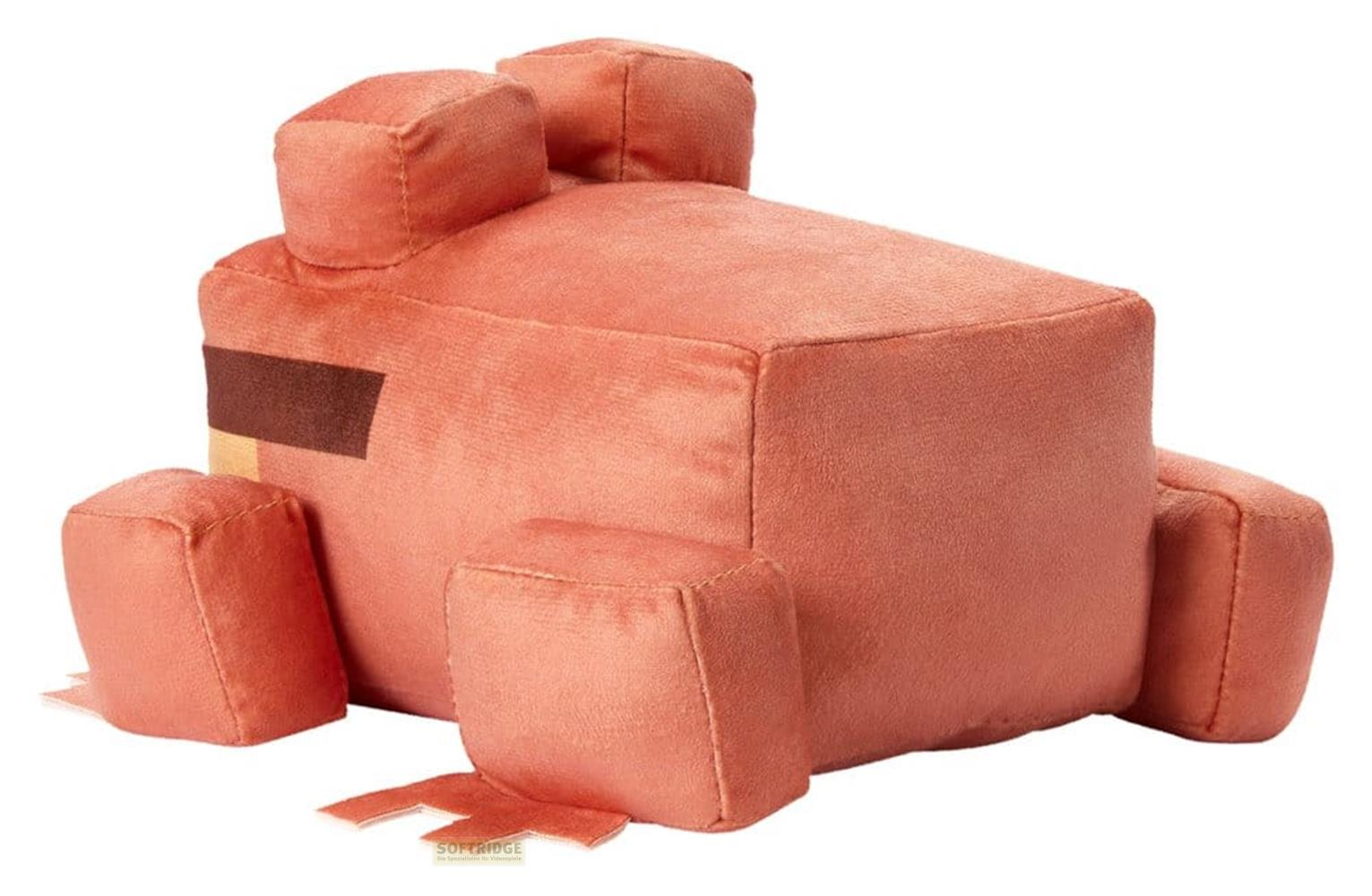 Un peluche cúbico de color coral con detalles marrones y cuatro patas pequeñas.