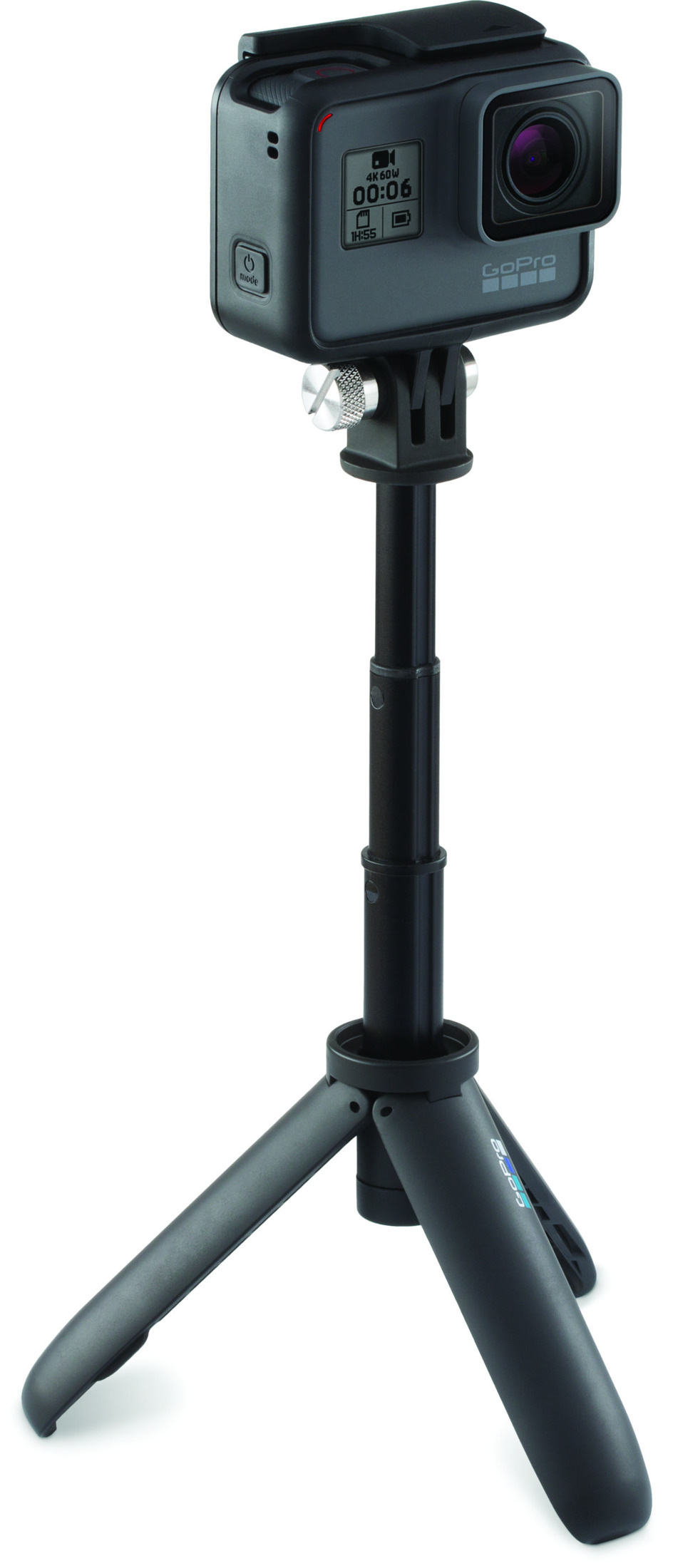 Una cámara GoPro negra sobre un trípode pequeño con mango extensible.