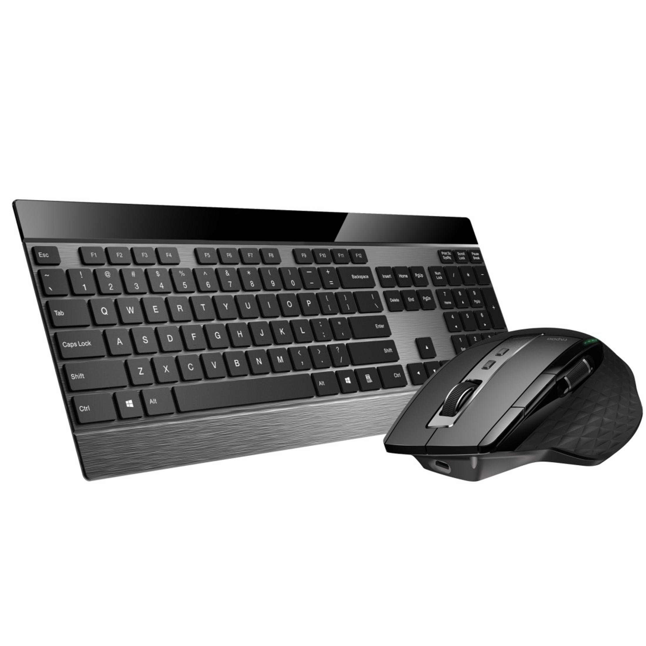 Eine schwarze Tastatur und eine schwarze Maus liegen auf weißem Hintergrund.