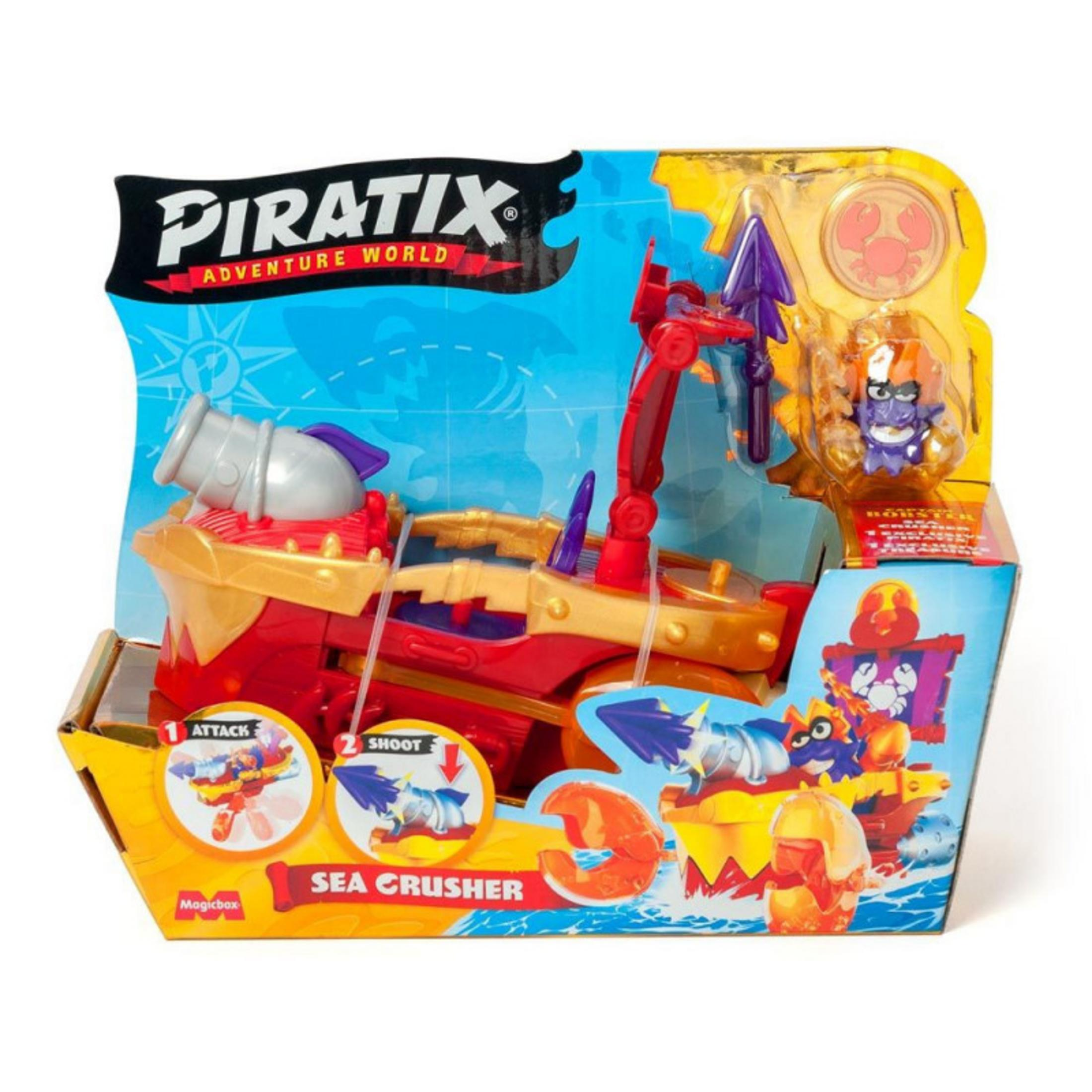 Un barco pirata de juguete con cañón, figura y motivo de cangrejo.