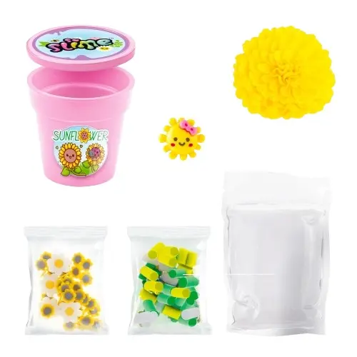 Taza rosa con pegatinas, bola amarilla, sol y bolsas de amuletos. Kit de slime.