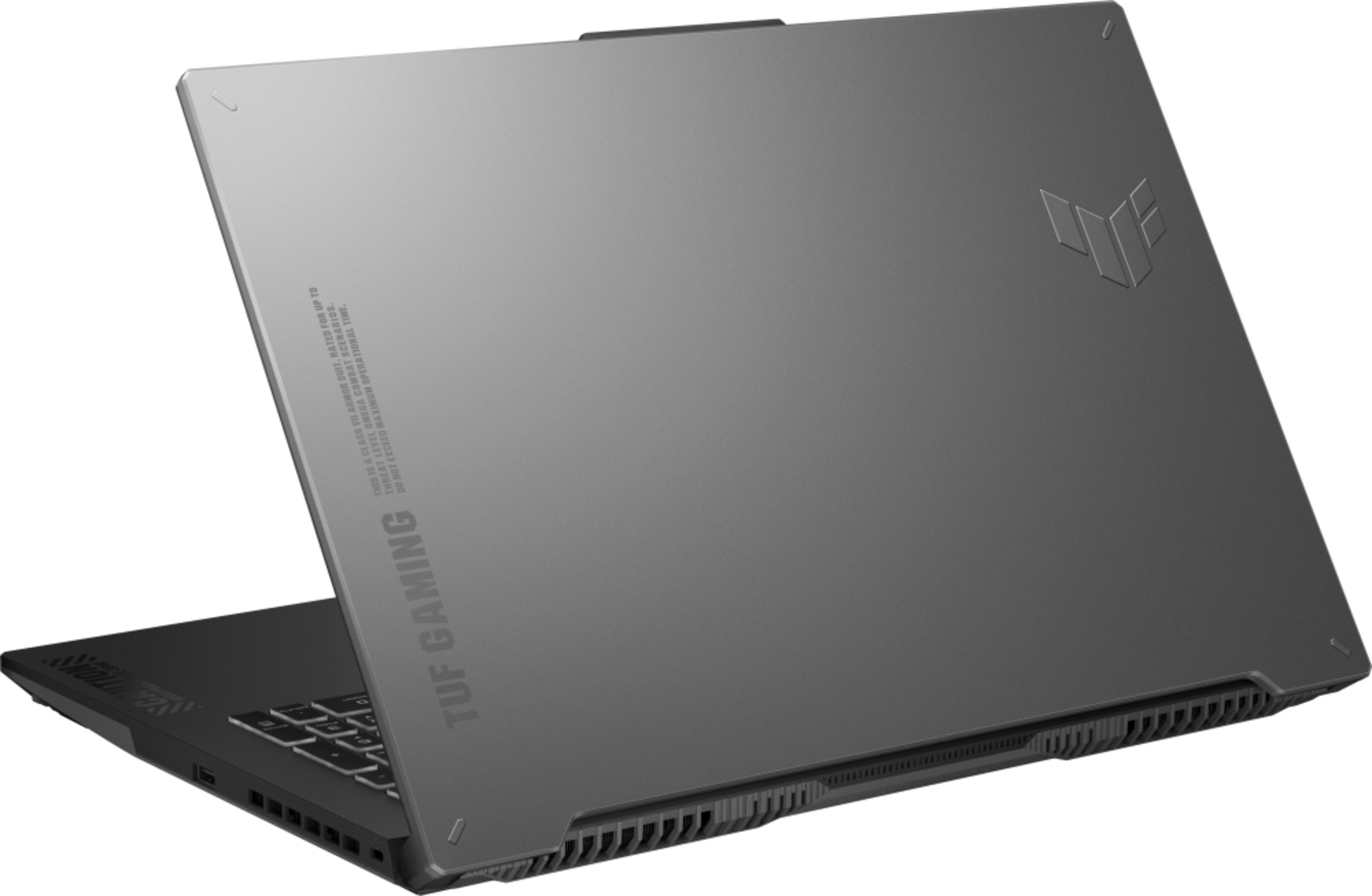 Ein graues Asus TUF Gaming Laptop mit Tastatur und Lüftungsschlitzen.