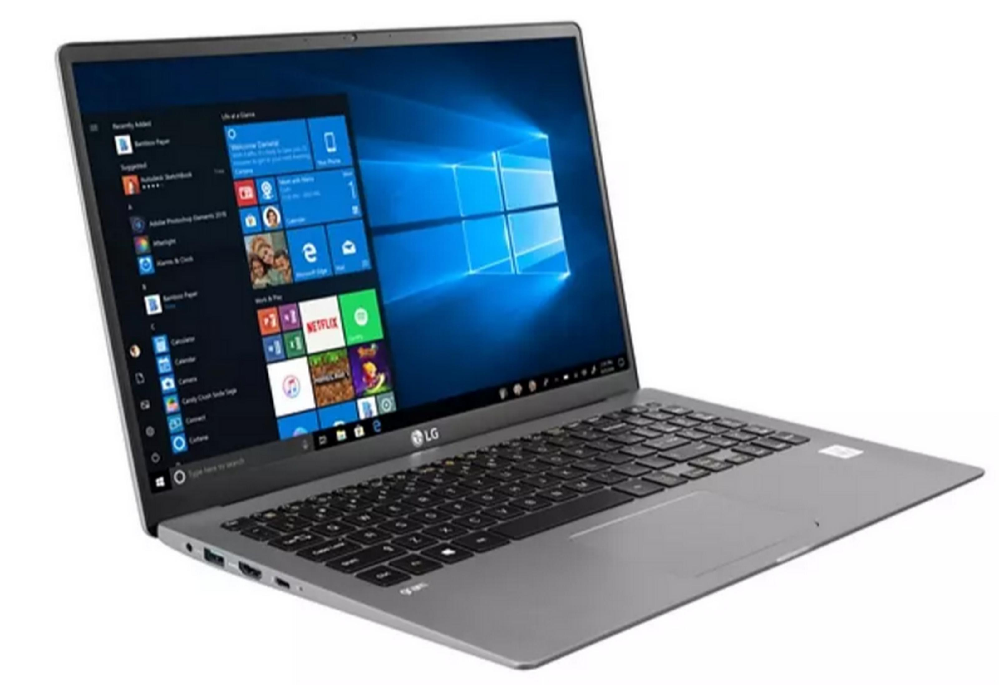 Un portátil LG gris con un menú de inicio de Windows en la pantalla.
