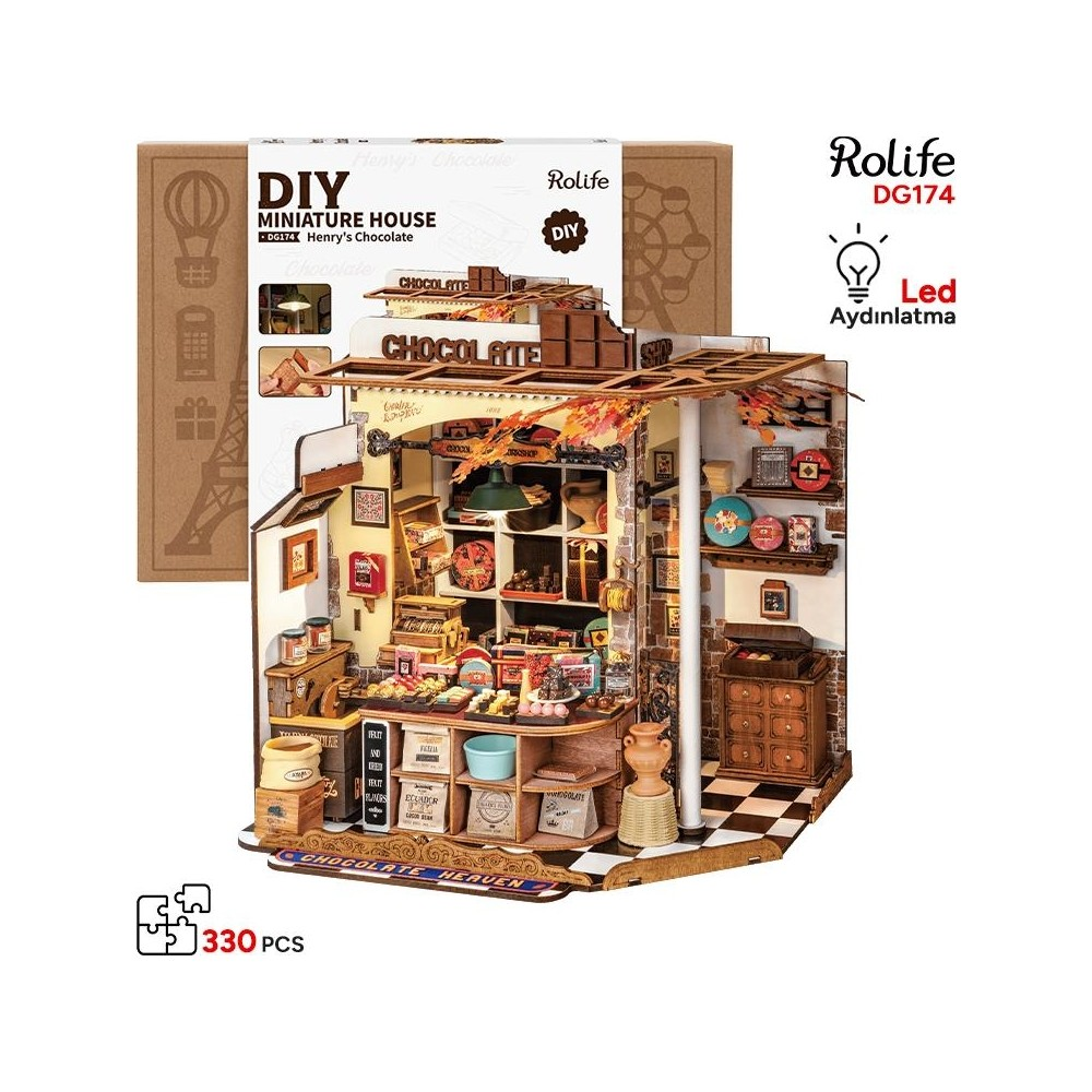 Detaylı minyatür çikolatalı ev model kiti, şekerlemeler ve LED ışıklarla.