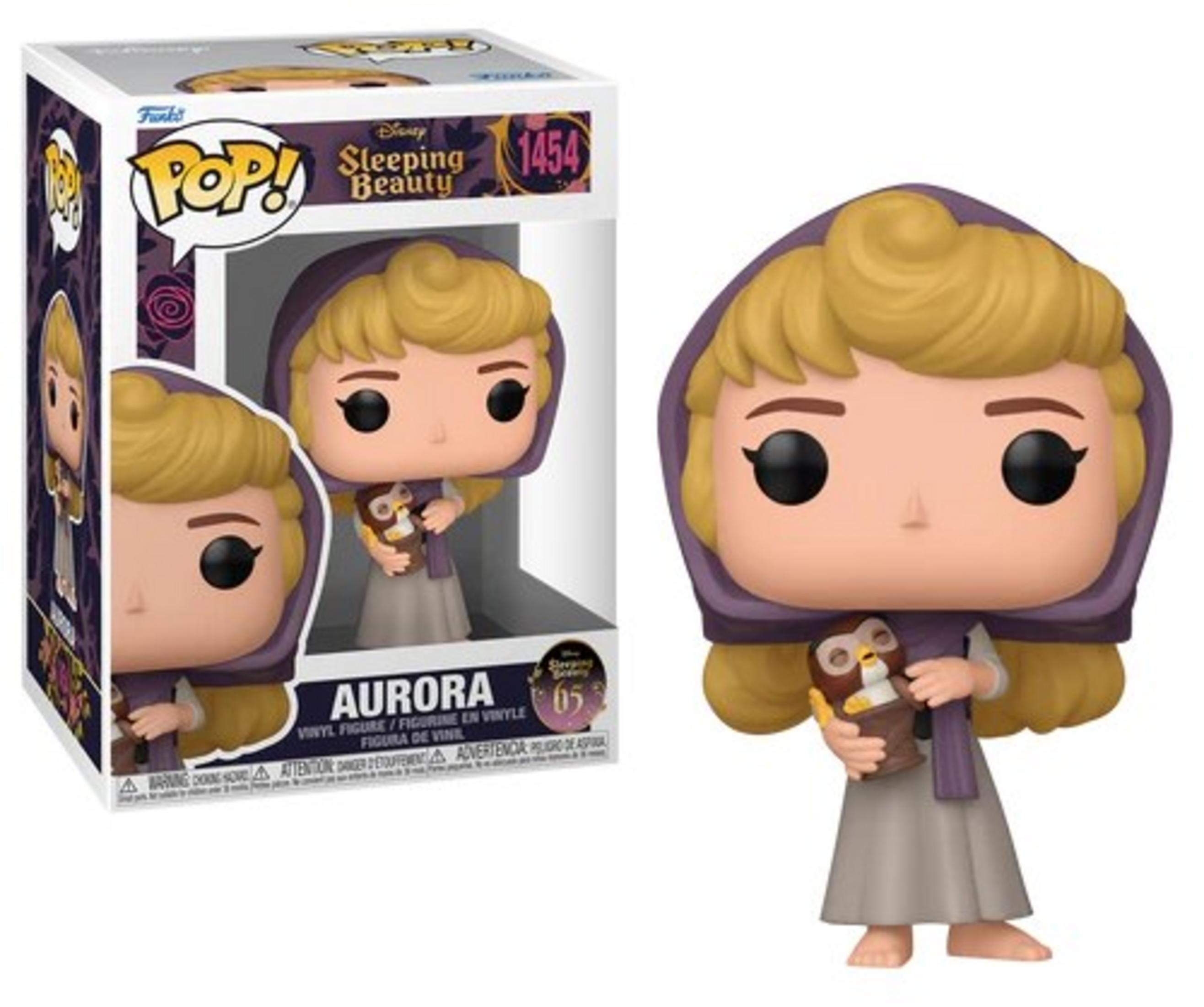 Action figure Funko Pop di Aurora con gufo, nella sua scatola. Capelli biondi, cappuccio viola, vestito grigio.